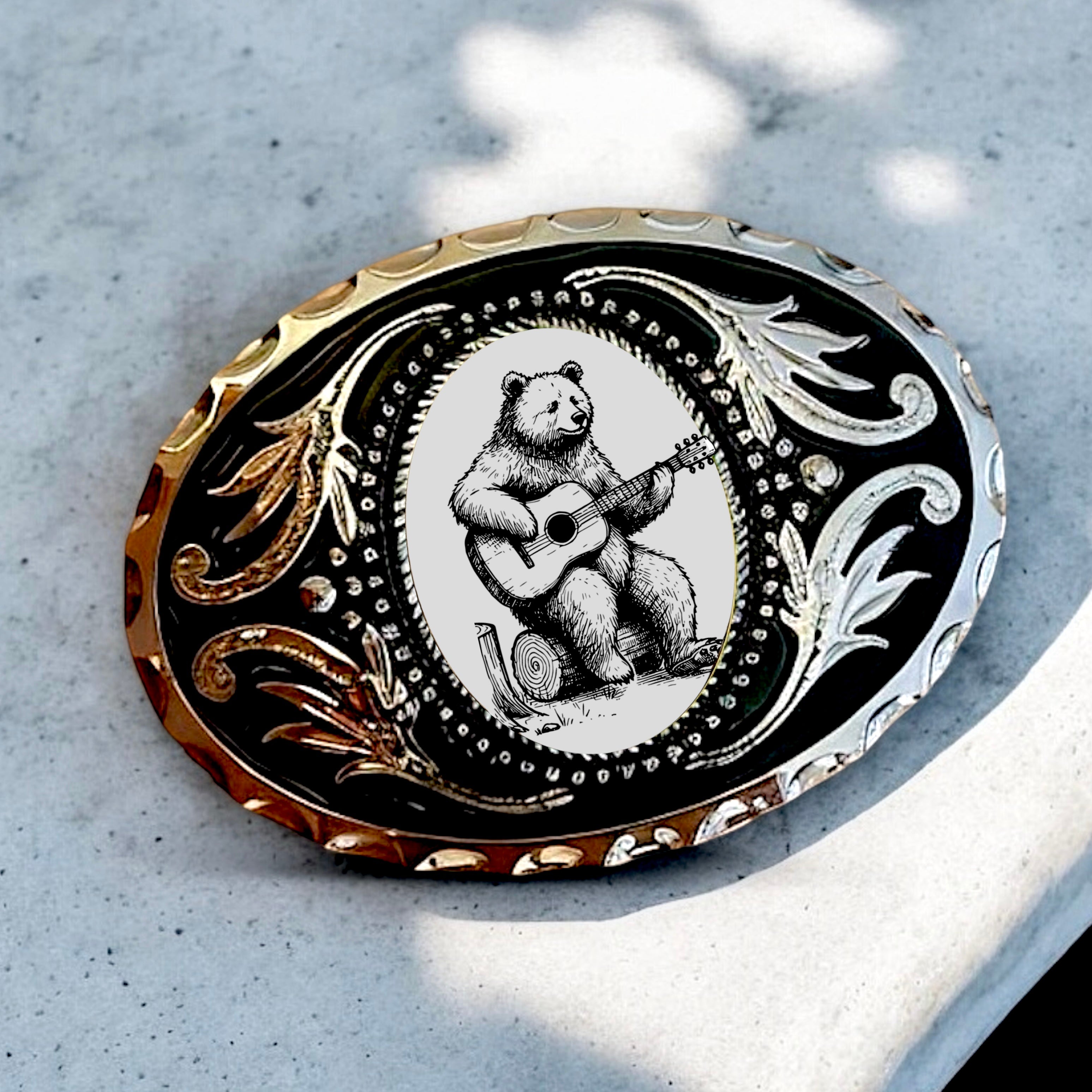 Bear Belt Buckle Cowboy Western Accessory on marble table