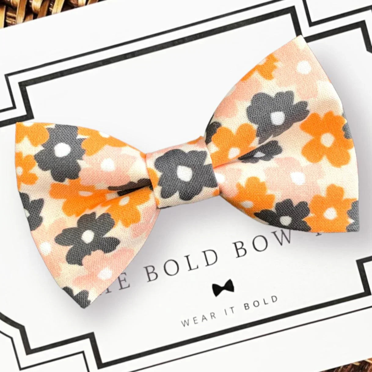 Dog bow tie size chart. Size Small is 3 1/2 inches wide for small dogs under 15 lbs. Size Medium is 4 inches wide for medium dogs between 15 band 40 lbs. Size Large is 4 1/2 inches wide for Large Dogs between 40 band 80 lbs. Size Extra Large is 5 1/2 inches wide for Extra Large Dogs over 80 lbs. Sizing is up to preference and pet bow ties slide on to dog collars with elastic.