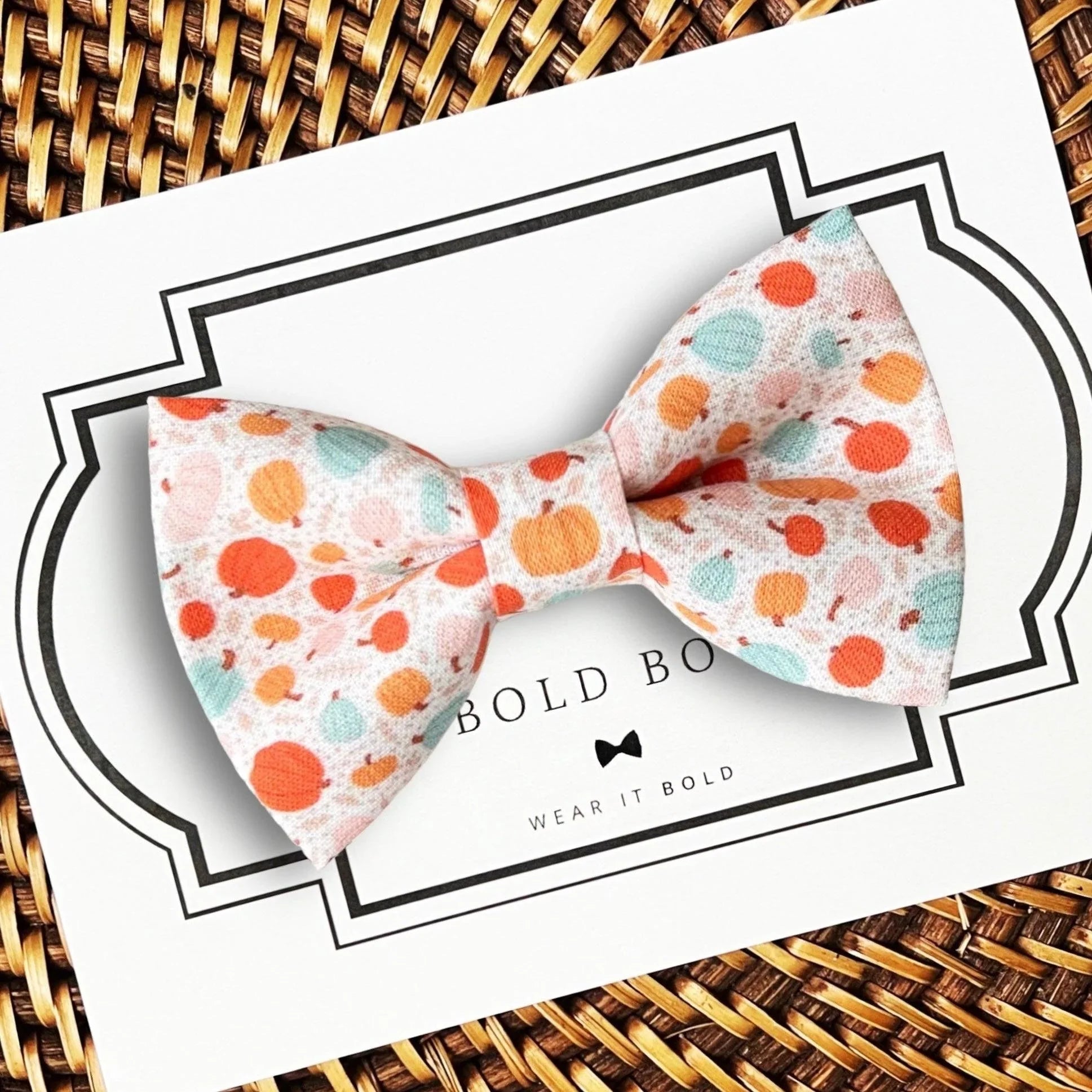 Dog bow tie size chart. Size Small is 3 1/2 inches wide for small dogs under 15 lbs. Size Medium is 4 inches wide for medium dogs between 15 band 40 lbs. Size Large is 4 1/2 inches wide for Large Dogs between 40 band 80 lbs. Size Extra Large is 5 1/2 inches wide for Extra Large Dogs over 80 lbs. Sizing is up to preference and pet bow ties slide on to dog collars with elastic.