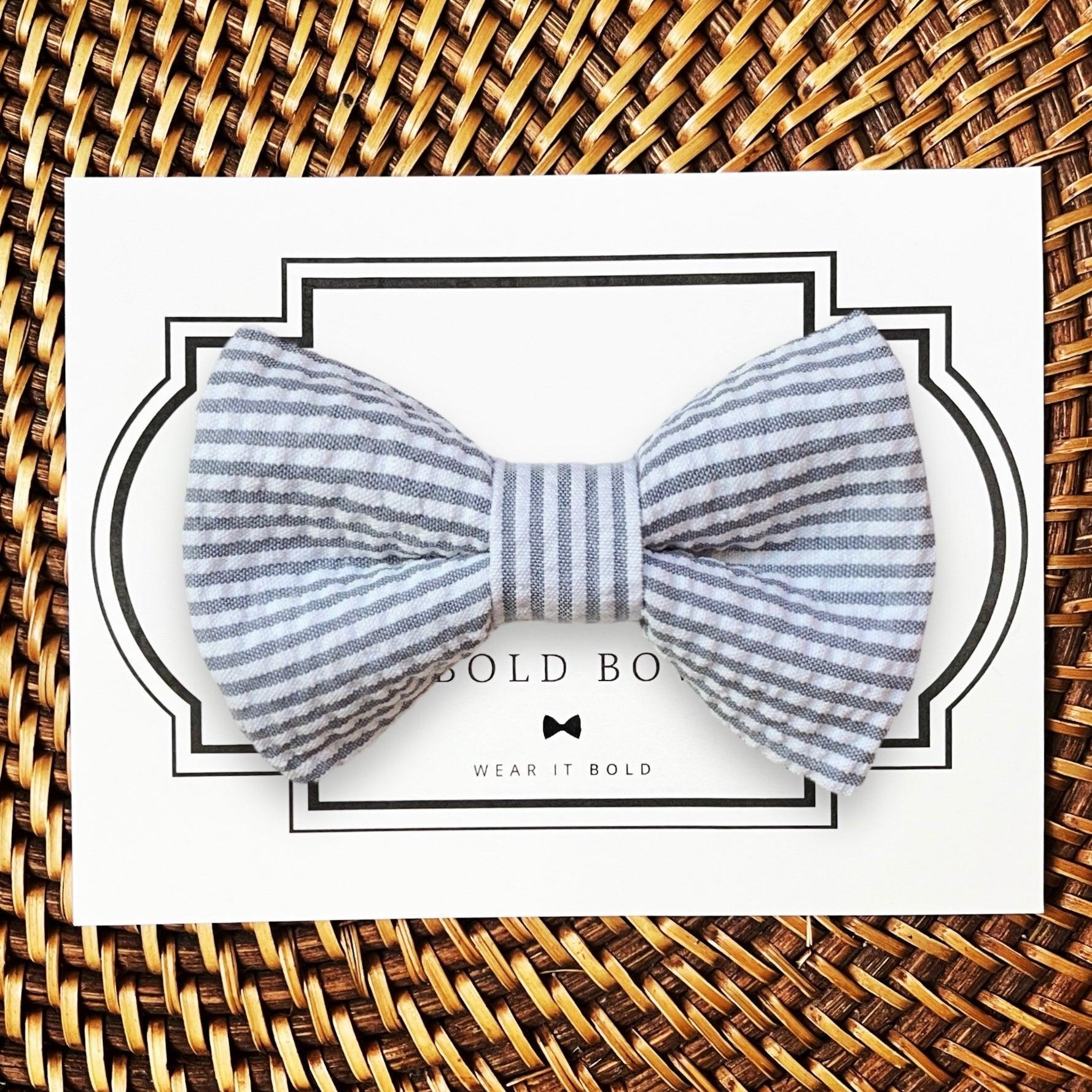 Dog bow tie size chart. Size Small is 3 1/2 inches wide for small dogs under 15 lbs. Size Medium is 4 inches wide for medium dogs between 15 band 40 lbs. Size Large is 4 1/2 inches wide for Large Dogs between 40 band 80 lbs. Size Extra Large is 5 1/2 inches wide for Extra Large Dogs over 80 lbs. Sizing is up to preference and pet bow ties slide on to dog collars with elastic.