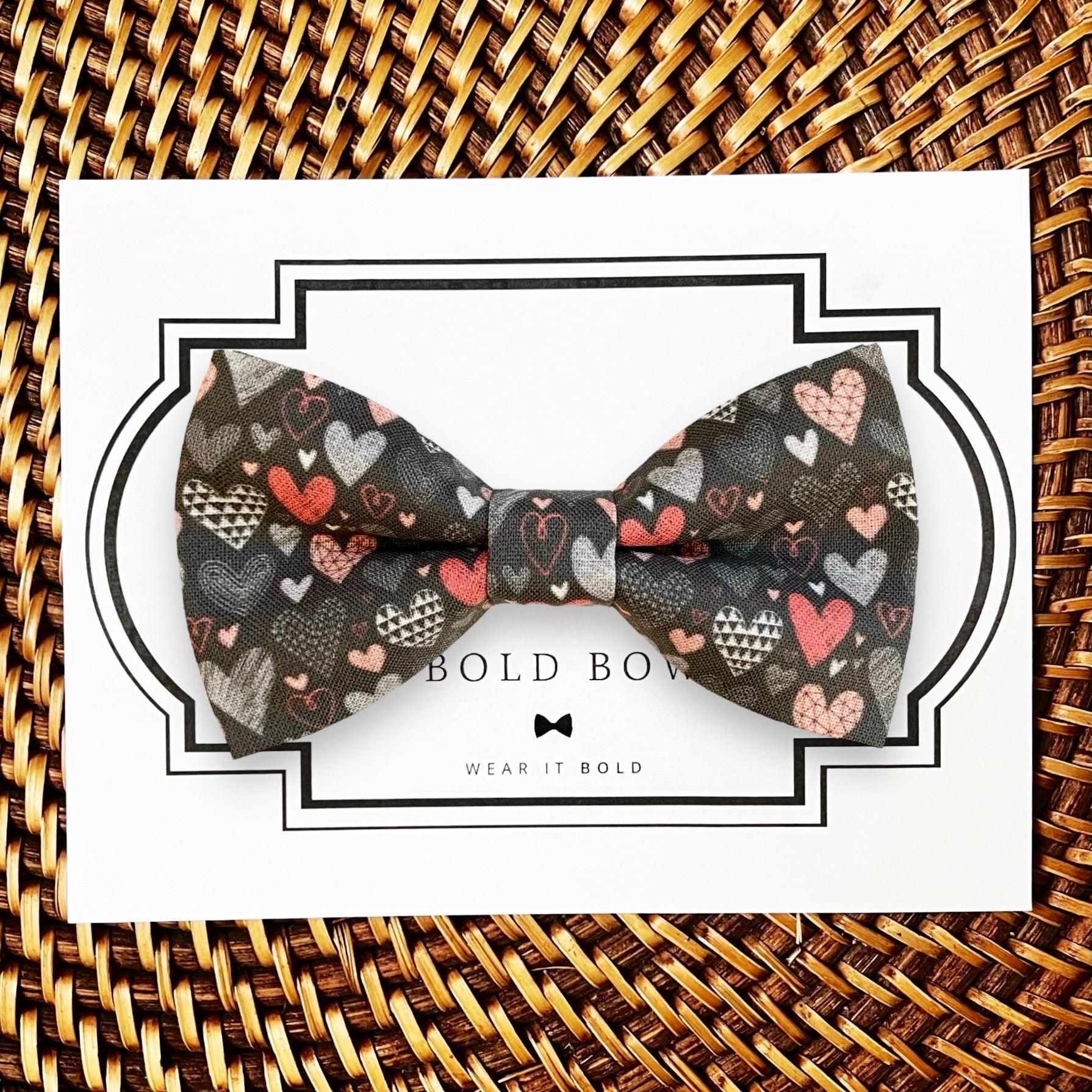Dog bow tie size chart. Size Small is 3 1/2 inches wide for small dogs under 15 lbs. Size Medium is 4 inches wide for medium dogs between 15 band 40 lbs. Size Large is 4 1/2 inches wide for Large Dogs between 40 band 80 lbs. Size Extra Large is 5 1/2 inches wide for Extra Large Dogs over 80 lbs. Sizing is up to preference and pet bow ties slide on to dog collars with elastic.