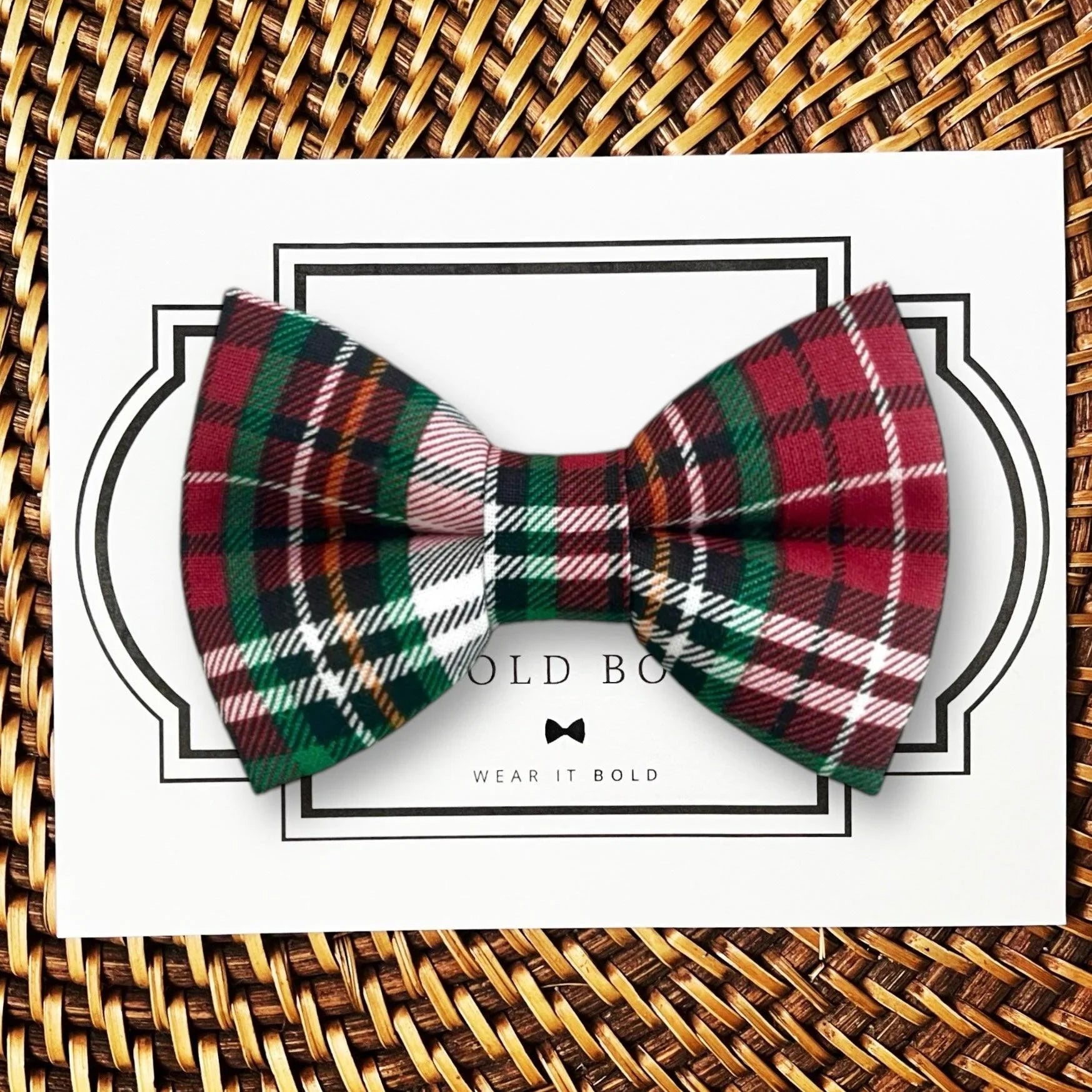 Dog bow tie size chart. Size Small is 3 1/2 inches wide for small dogs under 15 lbs. Size Medium is 4 inches wide for medium dogs between 15 band 40 lbs. Size Large is 4 1/2 inches wide for Large Dogs between 40 band 80 lbs. Size Extra Large is 5 1/2 inches wide for Extra Large Dogs over 80 lbs. Sizing is up to preference and pet bow ties slide on to dog collars with elastic.