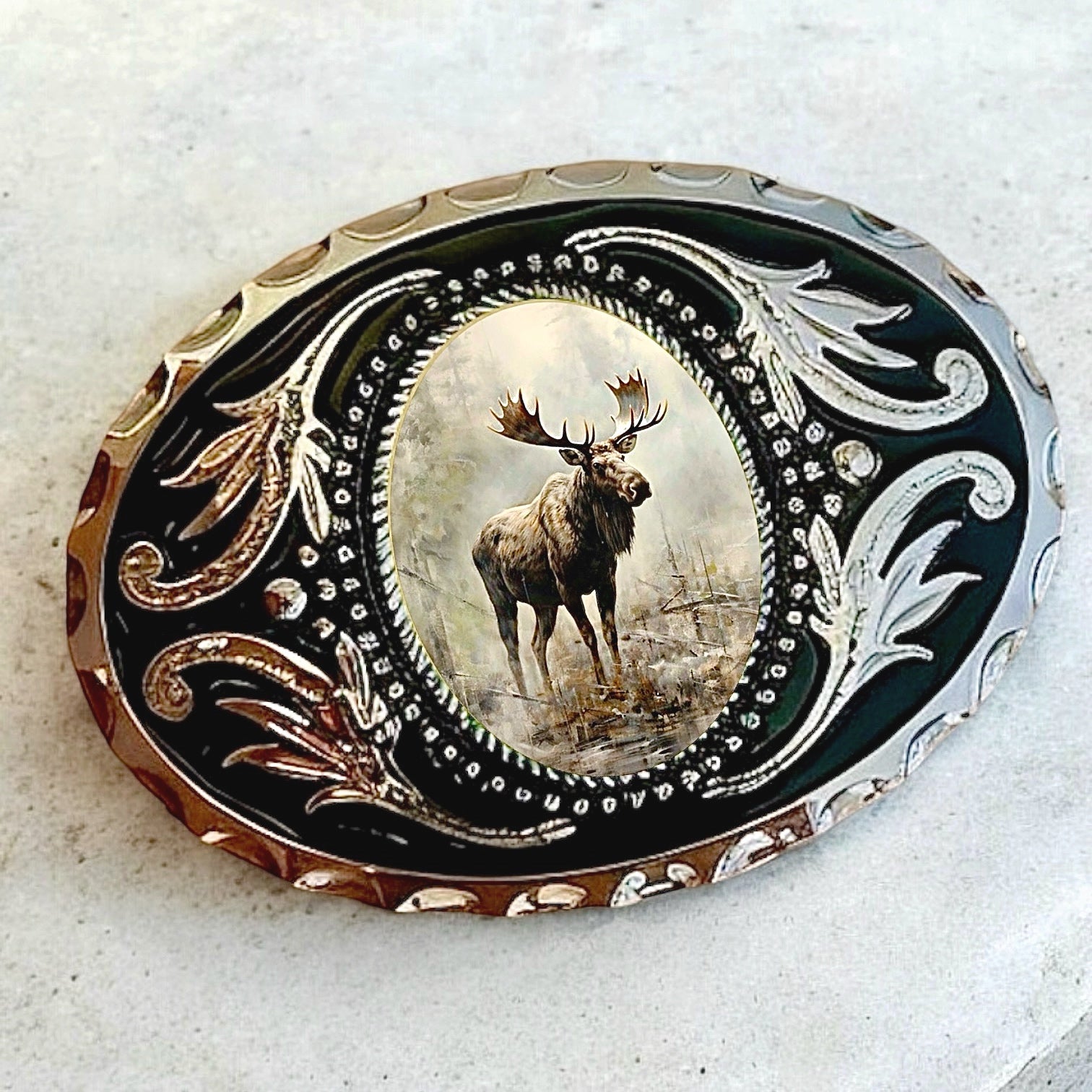 Moose Belt Buckle Cowboy Western Accessory on marble table
