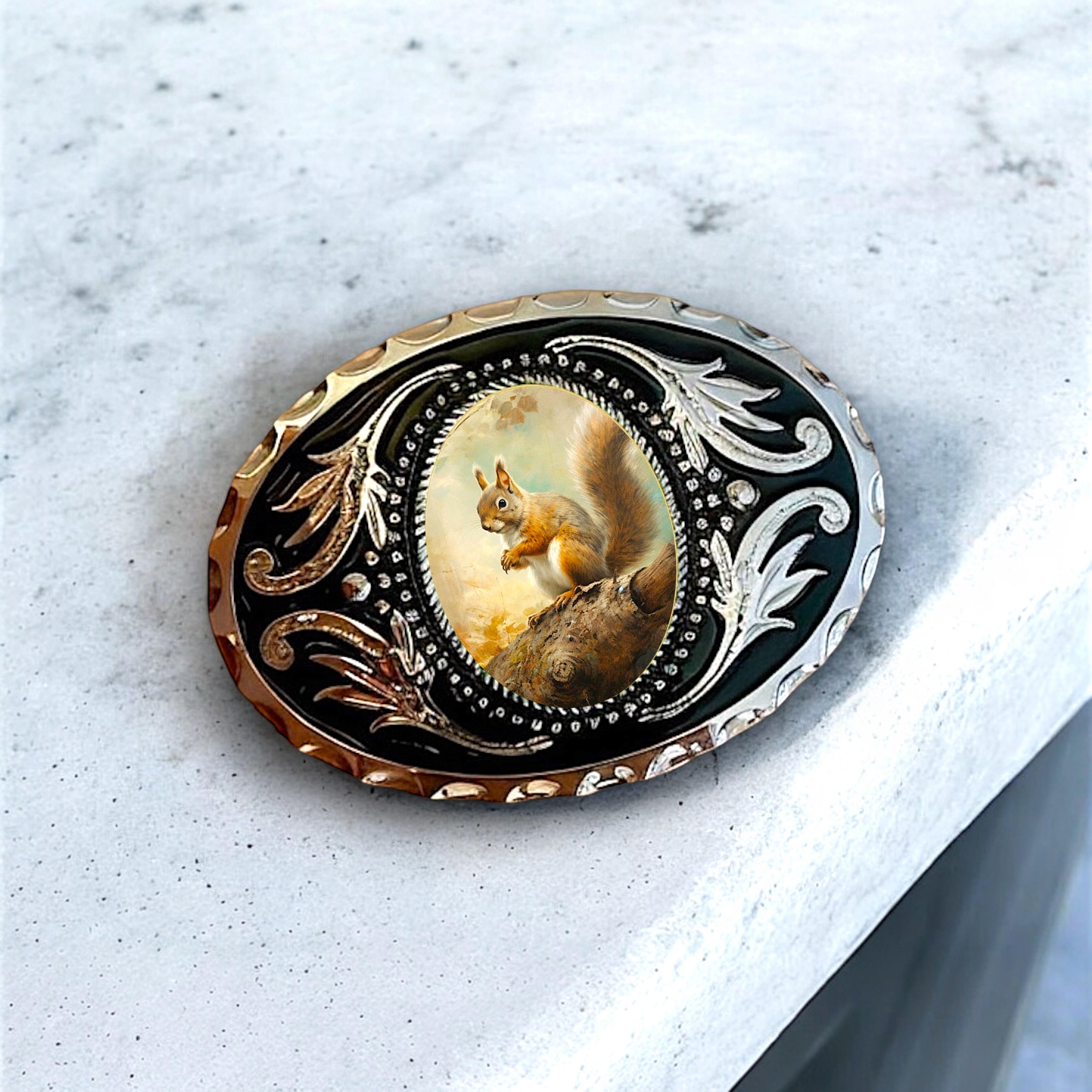 Squirrel Belt Buckle Cowboy Western Accessory on marble table