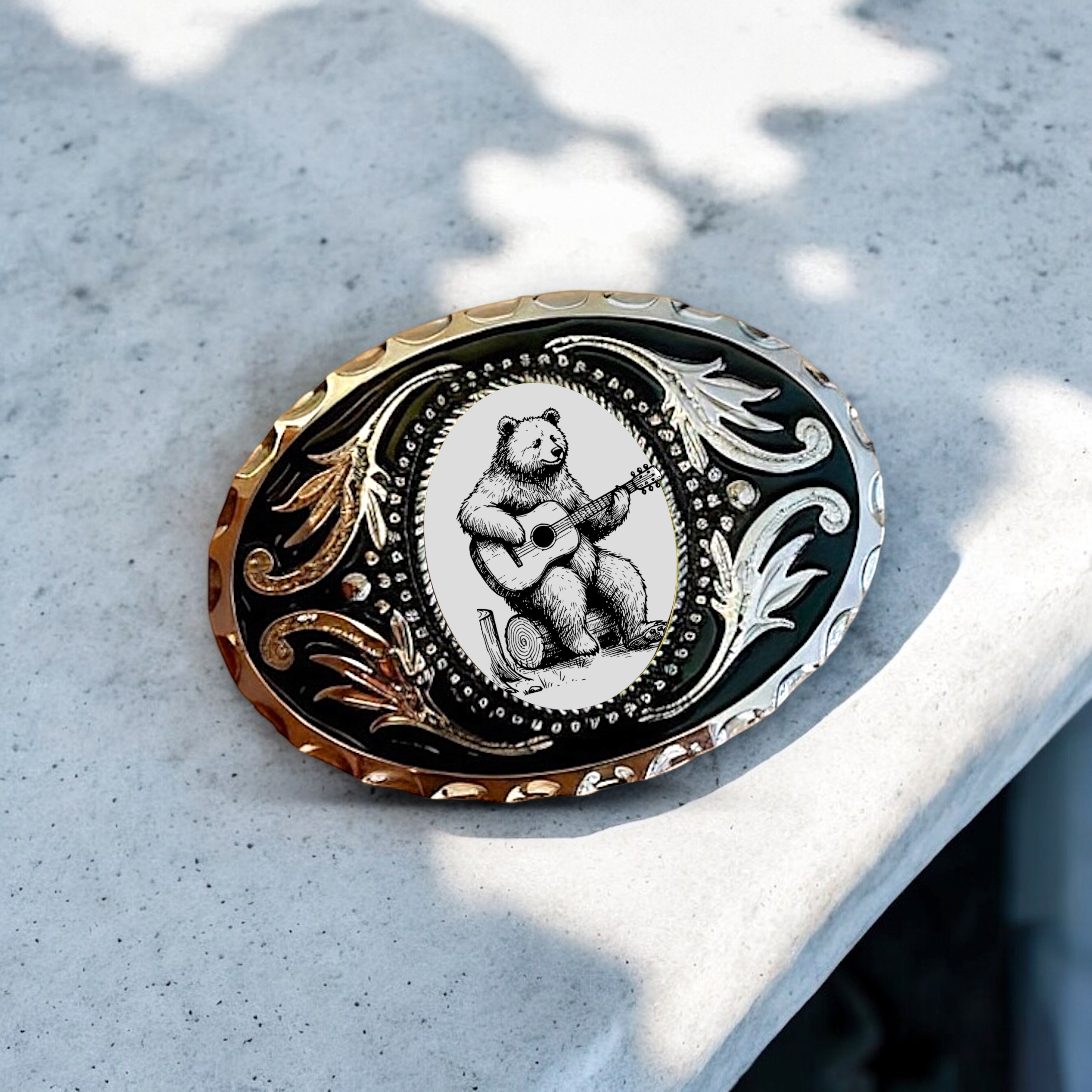 Bear Belt Buckle Cowboy Western Accessory on marble table