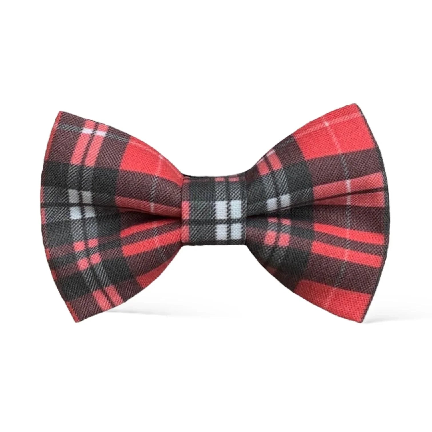 Size chart for pre-tied bow ties from The Bold Bow Tie detailing measurements across three sizes. Small is 3.5 inches wide and recommended for ages 6 months to 5 years. Medium is 4 inches wide and recommended for ages 6 to 12 years. Large is 4.5 inches wide and recommended for ages 13 years and up. Visual icons illustrate the relative sizes with horizontal arrows showing that width is measured from wingtip to wingtip. Bottom text notes that all bow ties are pre-tied and ready to add to your outfit.