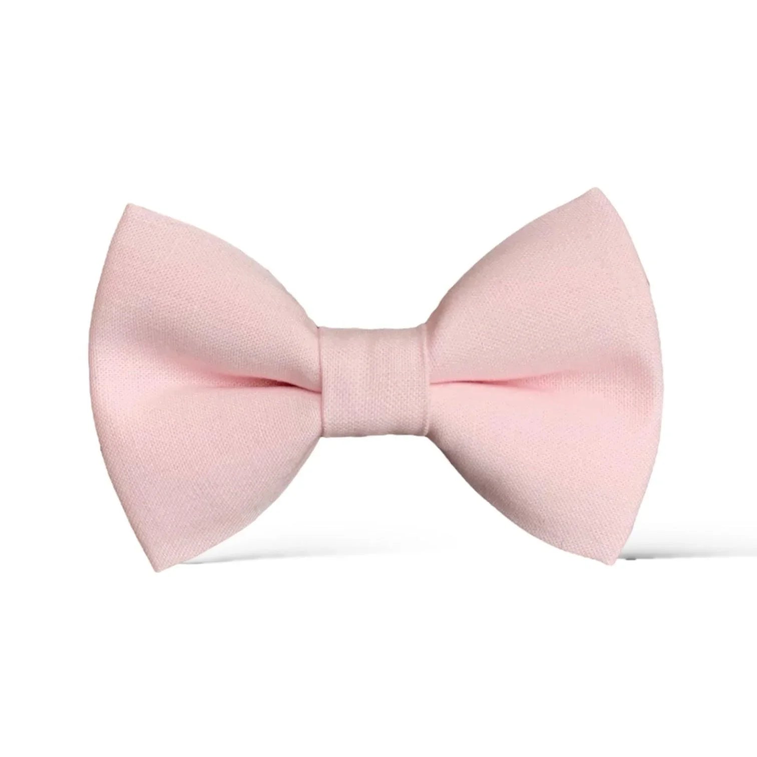 Size chart for pre-tied bow ties from The Bold Bow Tie detailing measurements across three sizes. Small is 3.5 inches wide and recommended for ages 6 months to 5 years. Medium is 4 inches wide and recommended for ages 6 to 12 years. Large is 4.5 inches wide and recommended for ages 13 years and up. Visual icons illustrate the relative sizes with horizontal arrows showing that width is measured from wingtip to wingtip. Bottom text notes that all bow ties are pre-tied and ready to add to your outfit.