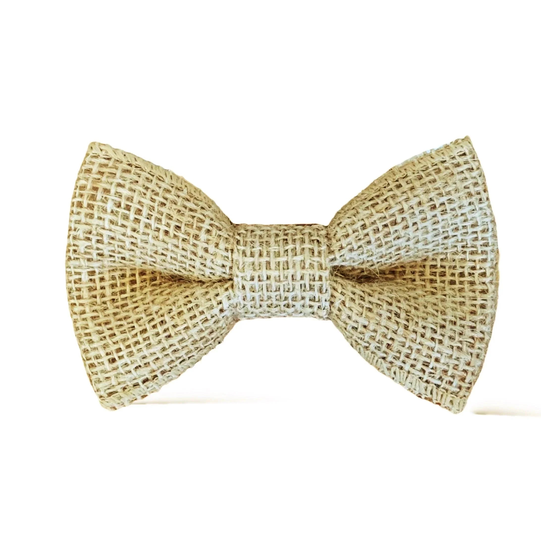 Size chart for pre-tied bow ties from The Bold Bow Tie detailing measurements across three sizes. Small is 3.5 inches wide and recommended for ages 6 months to 5 years. Medium is 4 inches wide and recommended for ages 6 to 12 years. Large is 4.5 inches wide and recommended for ages 13 years and up. Visual icons illustrate the relative sizes with horizontal arrows showing that width is measured from wingtip to wingtip. Bottom text notes that all bow ties are pre-tied and ready to add to your outfit.