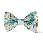 Wildflower Rifle Paper Co fabric Bow Tie in blue with white purple and pink flowers.