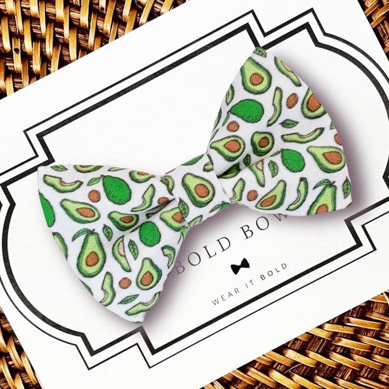 Avocado print bow tie for dogs or cats on a white card