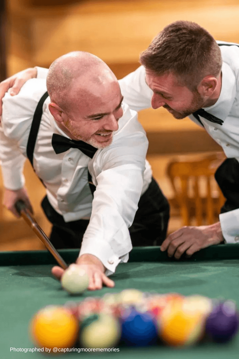 Groom and best man in black bow ties