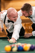 Groom and best man in black bow ties