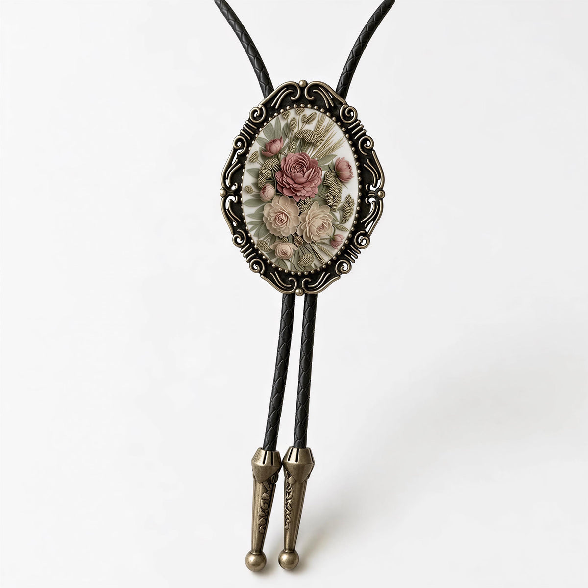 A decorative pendant featuring a floral design, hanging from a black cord with two gold-colored ends.