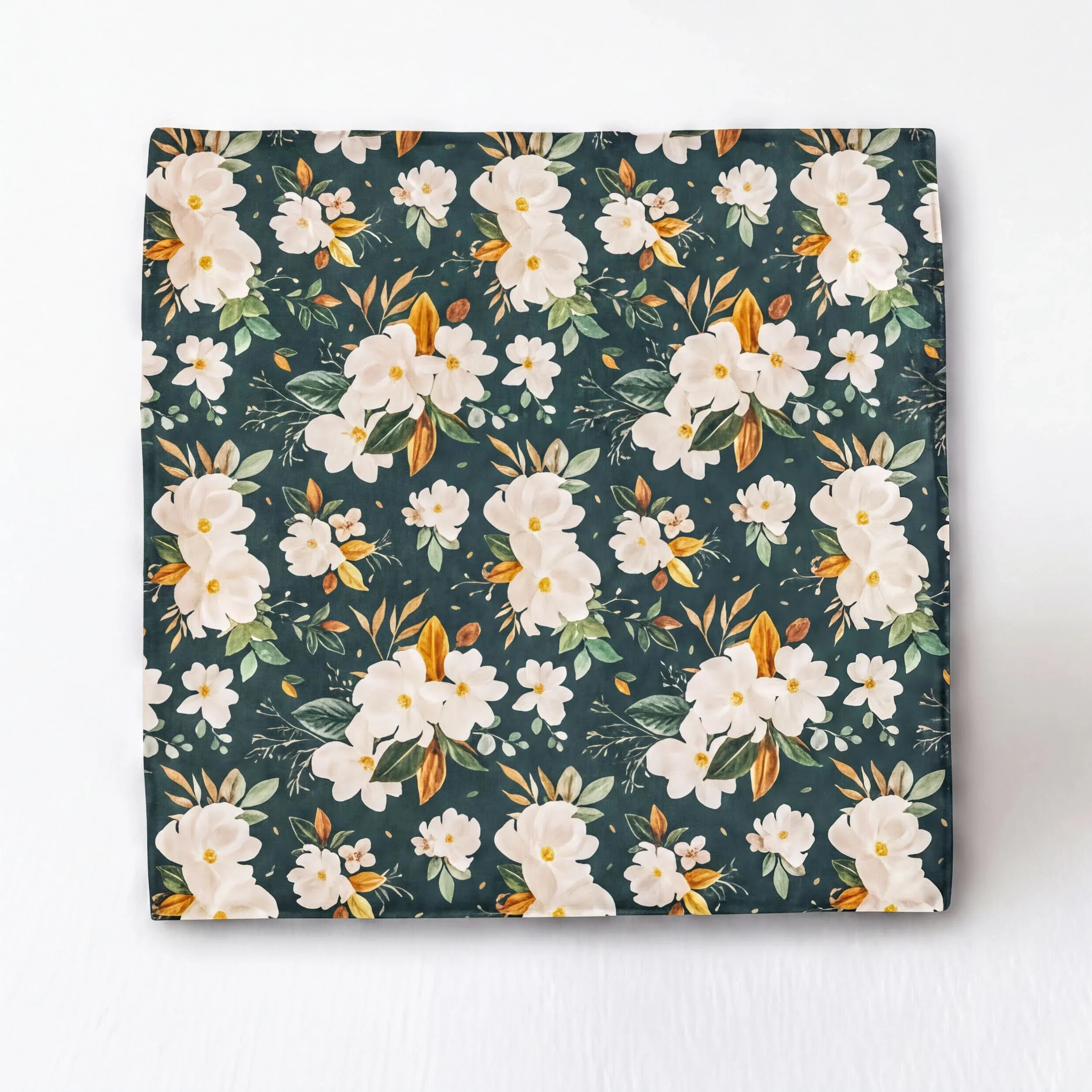 Emerald floral pocket square for groomsmen with a repeating floral pattern in shades of green and white.