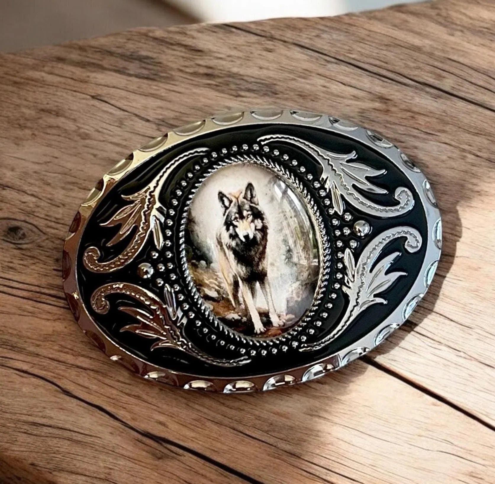 Two options for belt buckles: Option 1 has a leaf pattern and option 2 has flowers on it
