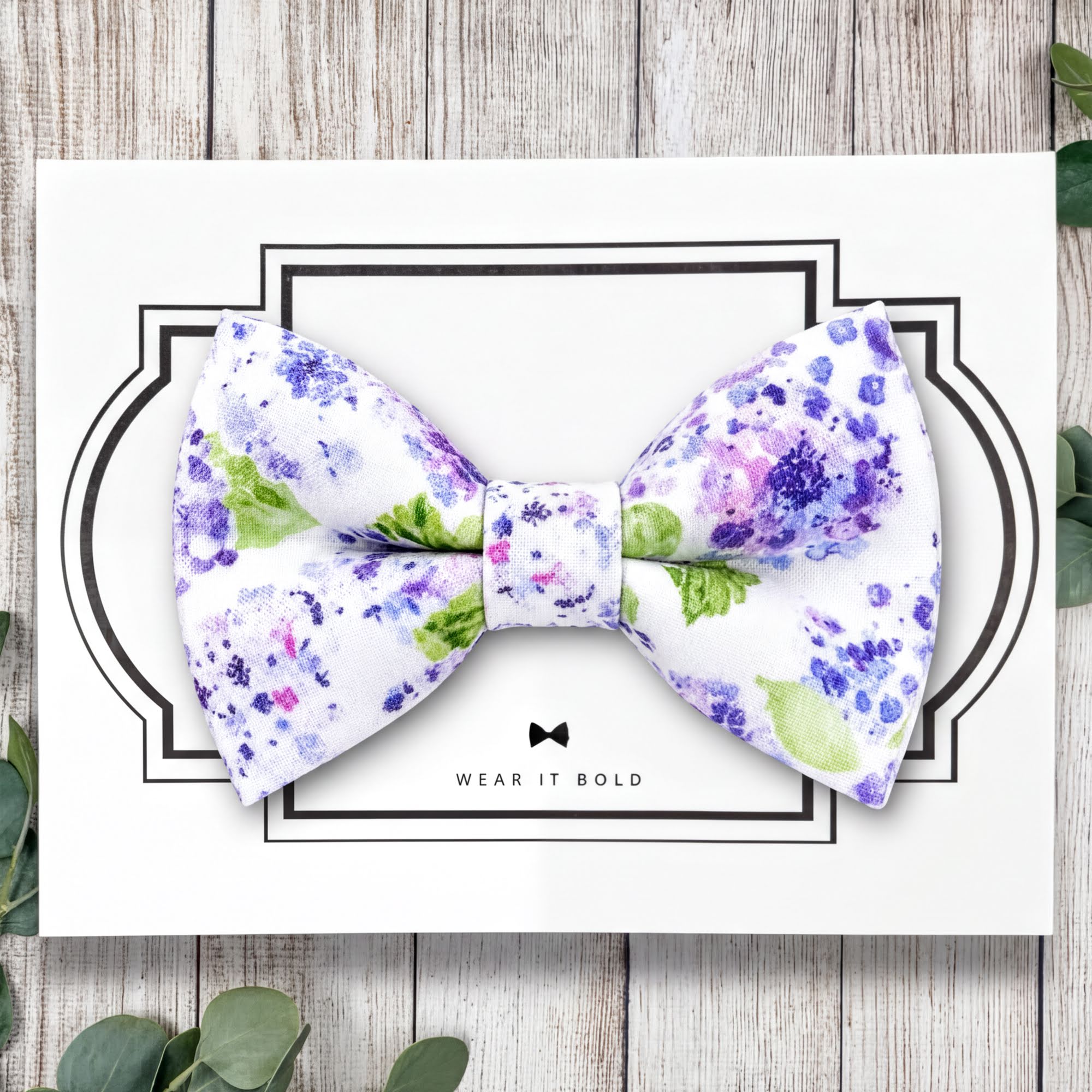 Handmade purple floral dog bowtie and cat bow tie designed as a pet collar accessory for weddings, gifts, and photos.