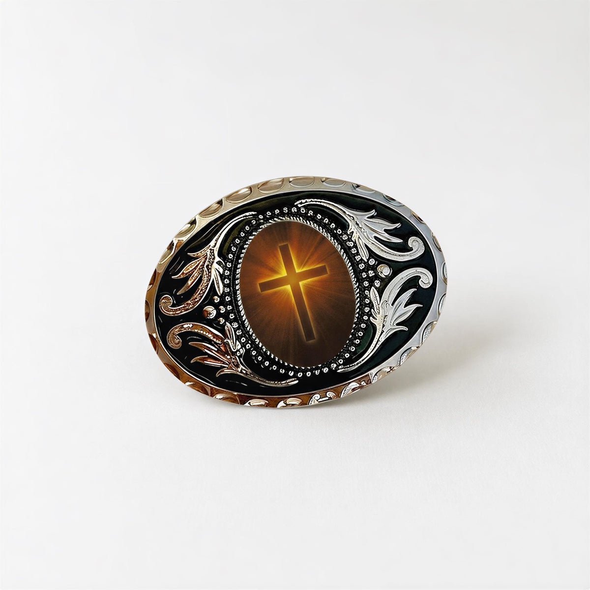 a decorative oval-shaped object with a cross at the center, surrounded by intricate floral designs.