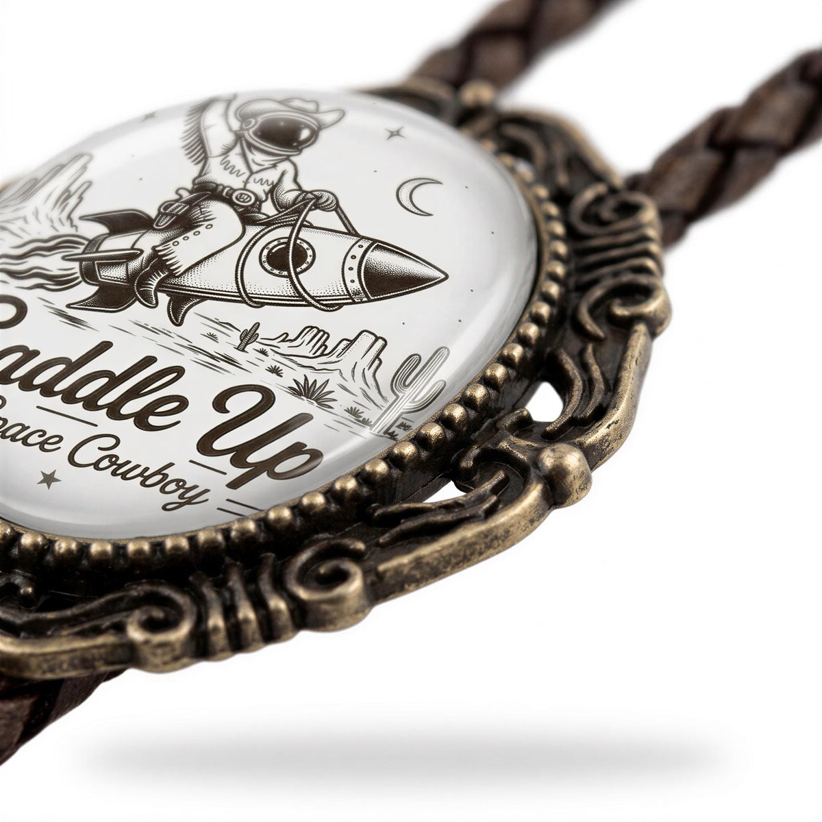 A close-up image of a decorative metal piece with a printed design featuring a cowboy riding a rocket ship.