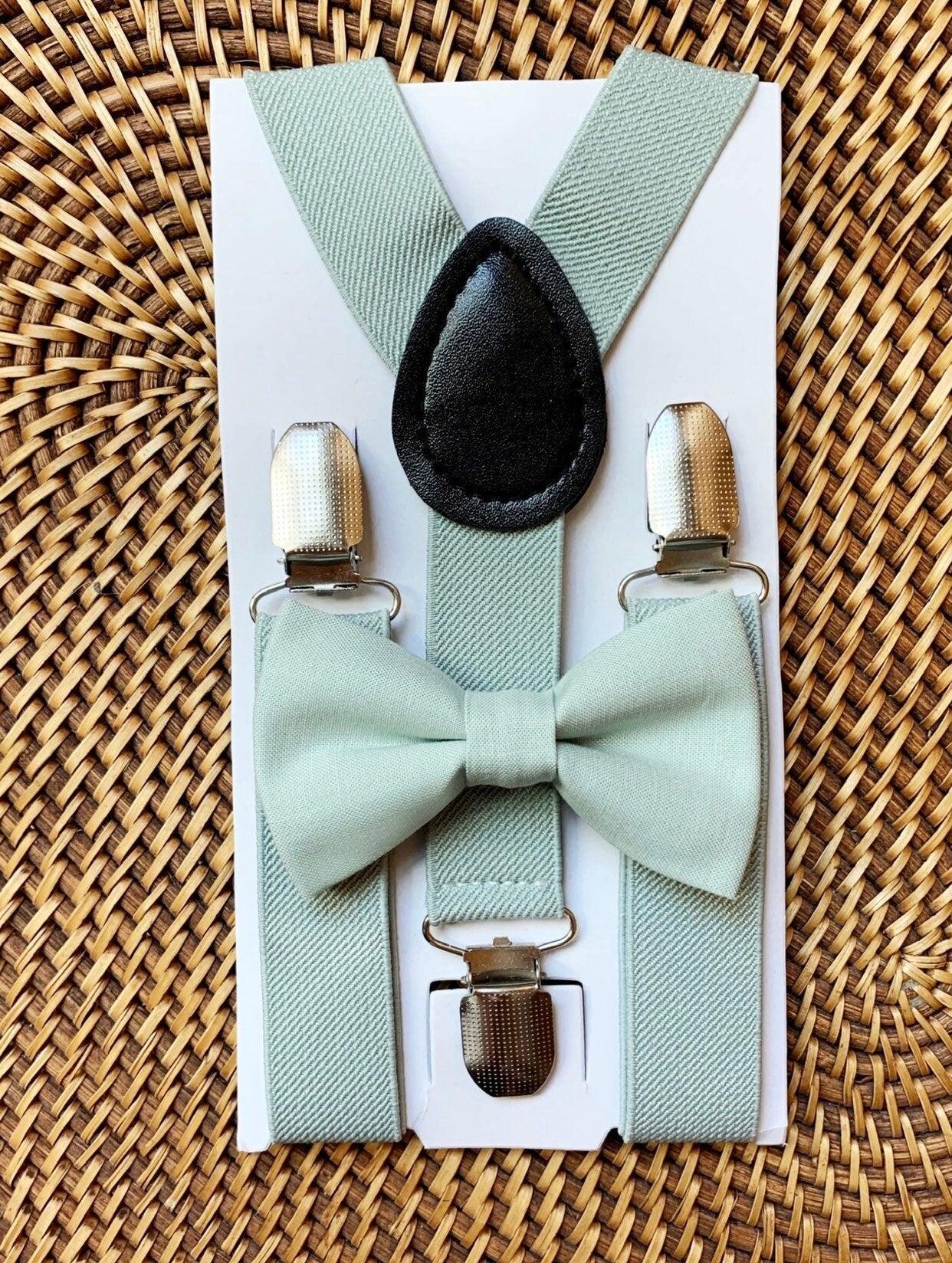 Size chart for suspender and bow tie sets from The Bold Bow Tie. Small (6mo-6yr): 18"-29" suspenders, 3.5" bow. Medium (7-12yr): 25.5"-40" suspenders, 4" bow. Adult (13yr-6ft tall): 25.5"-40" suspenders, 4.5" bow. Big & Tall (Over 6ft tall): 31"-53" suspenders, 4.5" bow. Instructions note to measure from the back waistband over the shoulder to the front waistband for a comfortable fit.