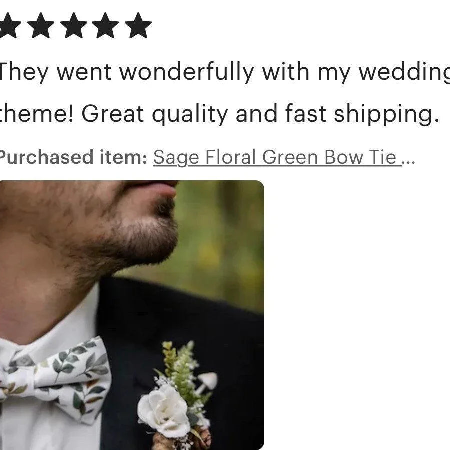 Close-up of a man wearing a Sage Floral Green Bow Tie with a boutonniere on his lapel