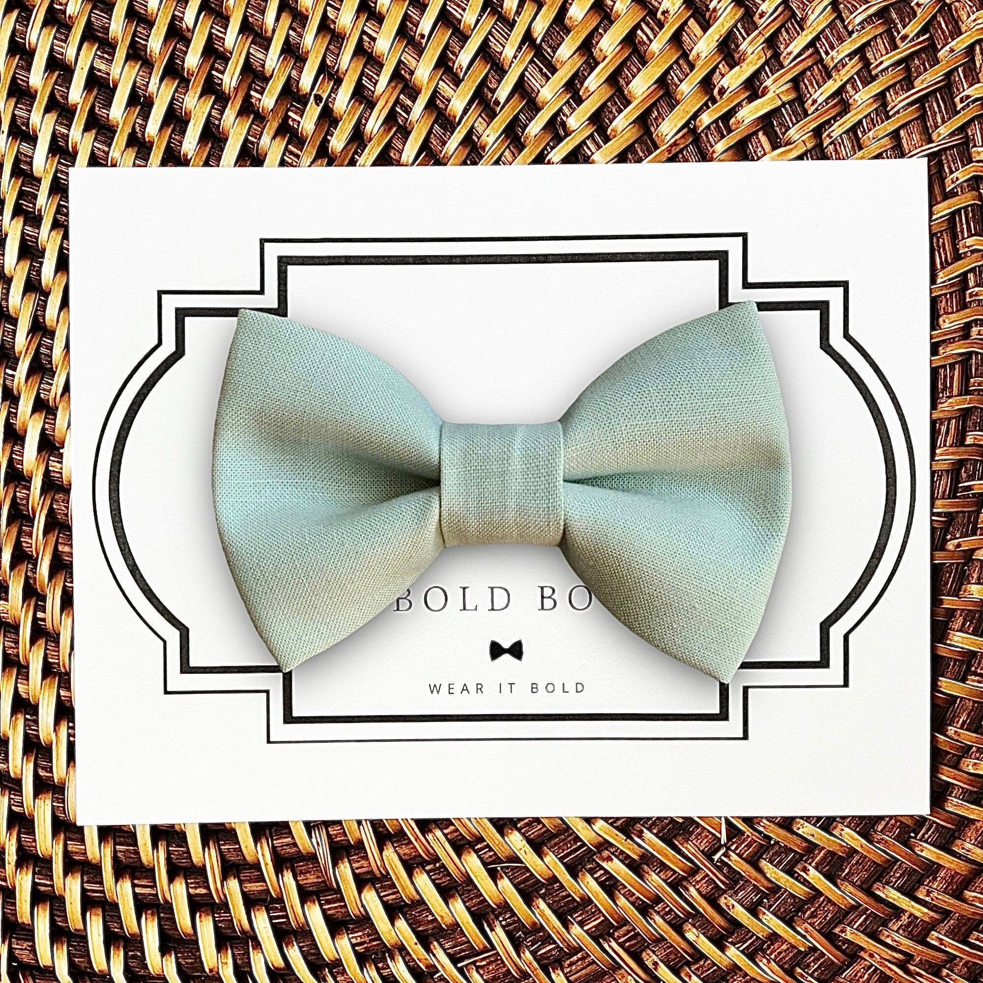 Dog bow tie size chart. Size Small is 3 1/2 inches wide for small dogs under 15 lbs. Size Medium is 4 inches wide for medium dogs between 15 band 40 lbs. Size Large is 4 1/2 inches wide for Large Dogs between 40 band 80 lbs. Size Extra Large is 5 1/2 inches wide for Extra Large Dogs over 80 lbs. Sizing is up to preference and pet bow ties slide on to dog collars with elastic.