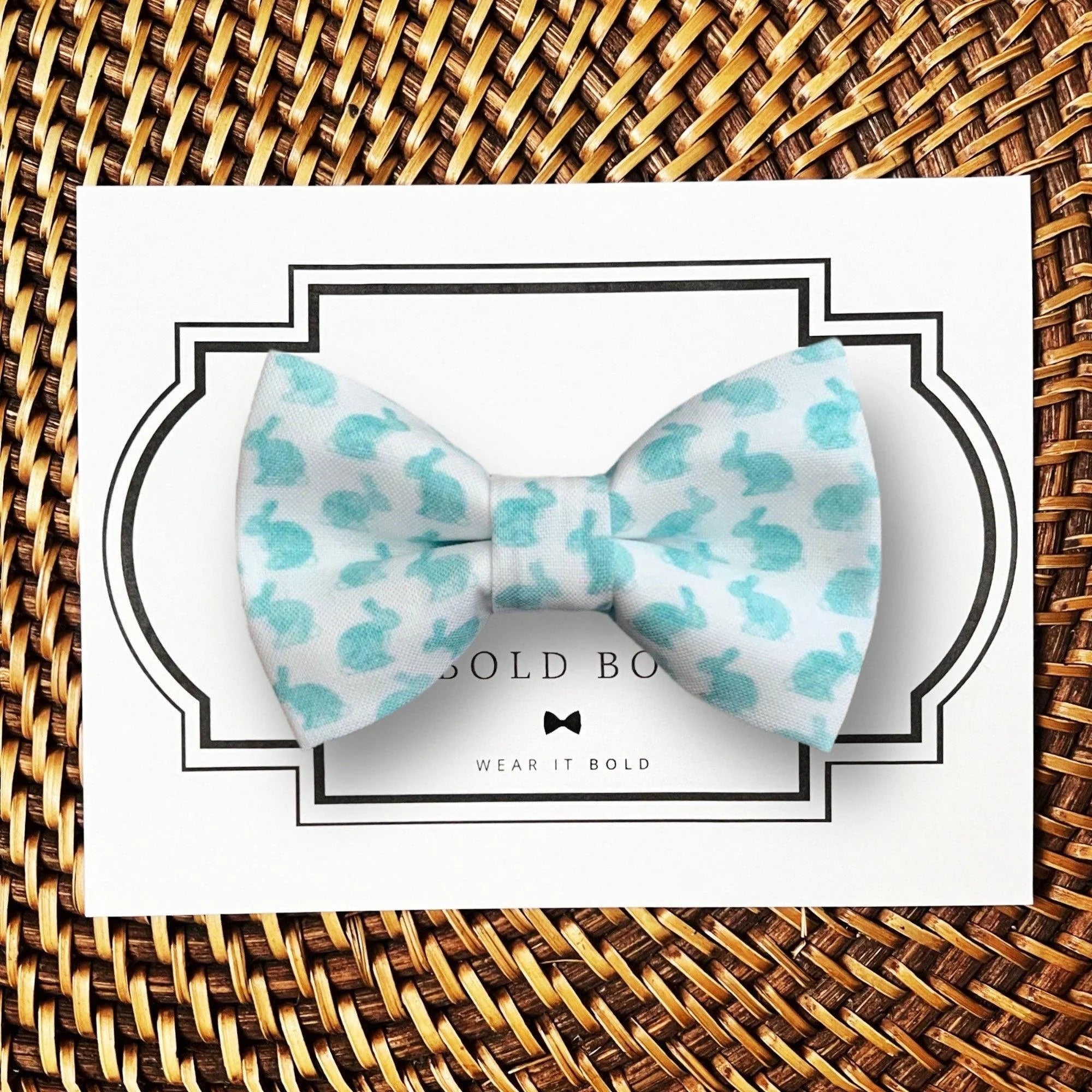 Dog bow tie size chart. Size Small is 3 1/2 inches wide for small dogs under 15 lbs. Size Medium is 4 inches wide for medium dogs between 15 band 40 lbs. Size Large is 4 1/2 inches wide for Large Dogs between 40 band 80 lbs. Size Extra Large is 5 1/2 inches wide for Extra Large Dogs over 80 lbs. Sizing is up to preference and pet bow ties slide on to dog collars with elastic.