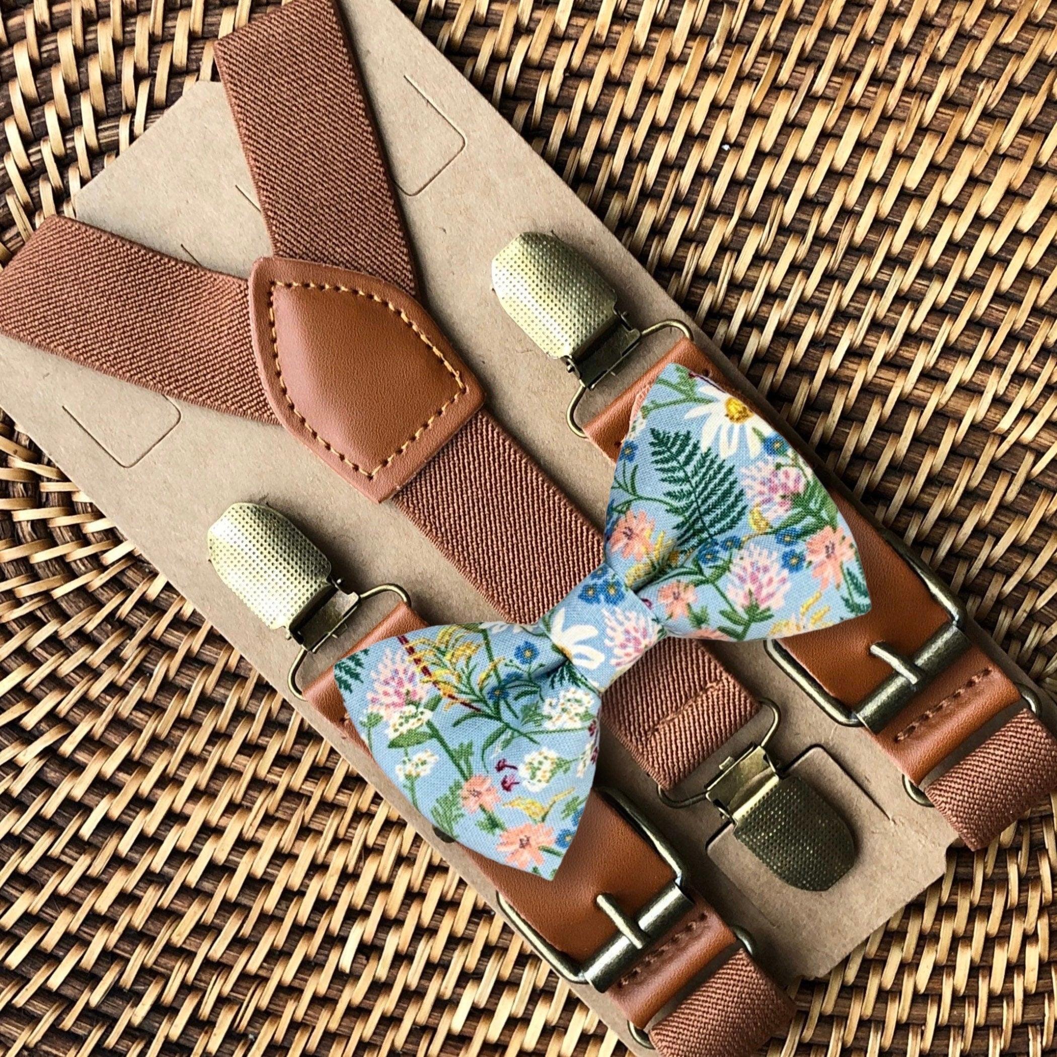 Size chart for suspender and bow tie sets from The Bold Bow Tie. X-Small (6mo-4yr): 15"-23" suspenders, 3.5" bow. Small (5-9yr): 18"-33" suspenders, 3.5" bow. Medium (10-12yr): 18"-33" suspenders, 4" bow. Adult (13yr-6'5"): 30"-53" suspenders, 4.5" bow. Big & Tall (Over 6'5"): 53"+ suspenders, 4.5" bow. Instructions note to measure from the back waistband over the shoulder to the front waistband for a comfortable fit.
