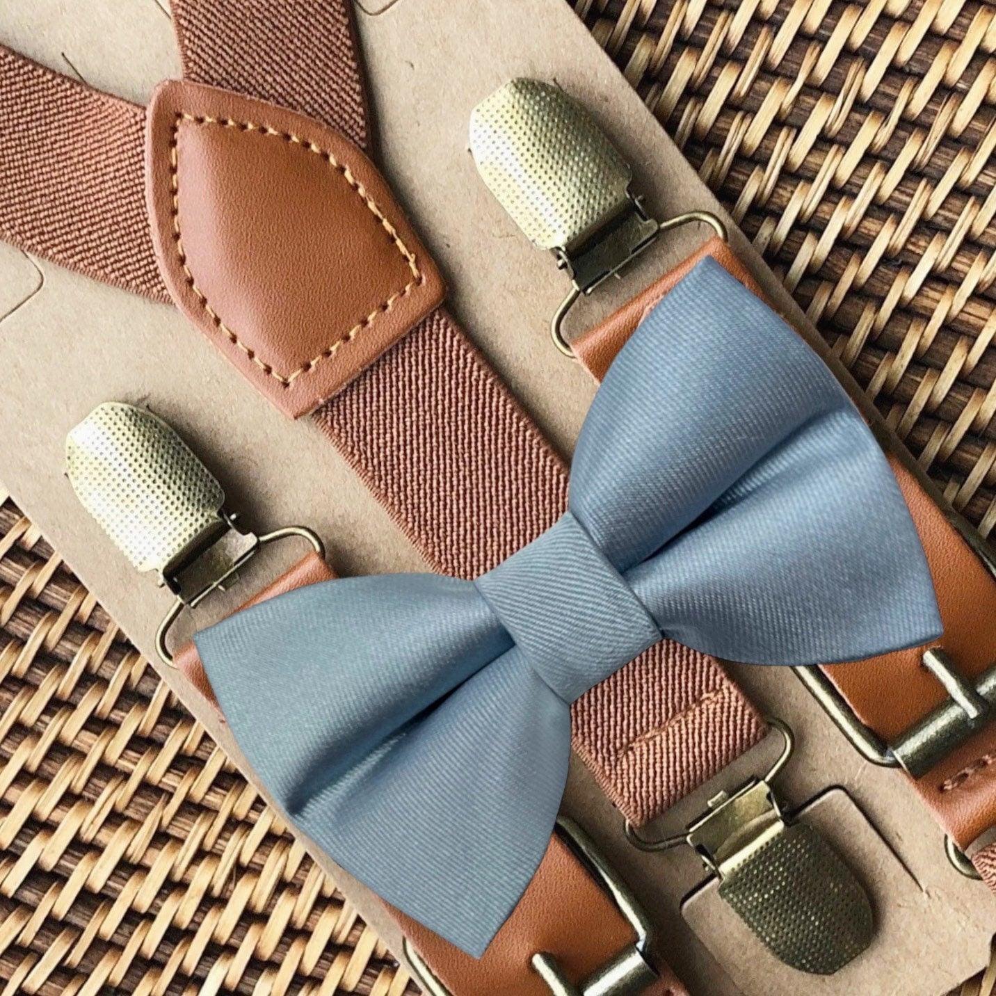 Size chart for suspender and bow tie sets from The Bold Bow Tie. X-Small (6mo-4yr): 15"-23" suspenders, 3.5" bow. Small (5-9yr): 18"-33" suspenders, 3.5" bow. Medium (10-12yr): 18"-33" suspenders, 4" bow. Adult (13yr-6'5"): 30"-53" suspenders, 4.5" bow. Big & Tall (Over 6'5"): 53"+ suspenders, 4.5" bow. Instructions note to measure from the back waistband over the shoulder to the front waistband for a comfortable fit.