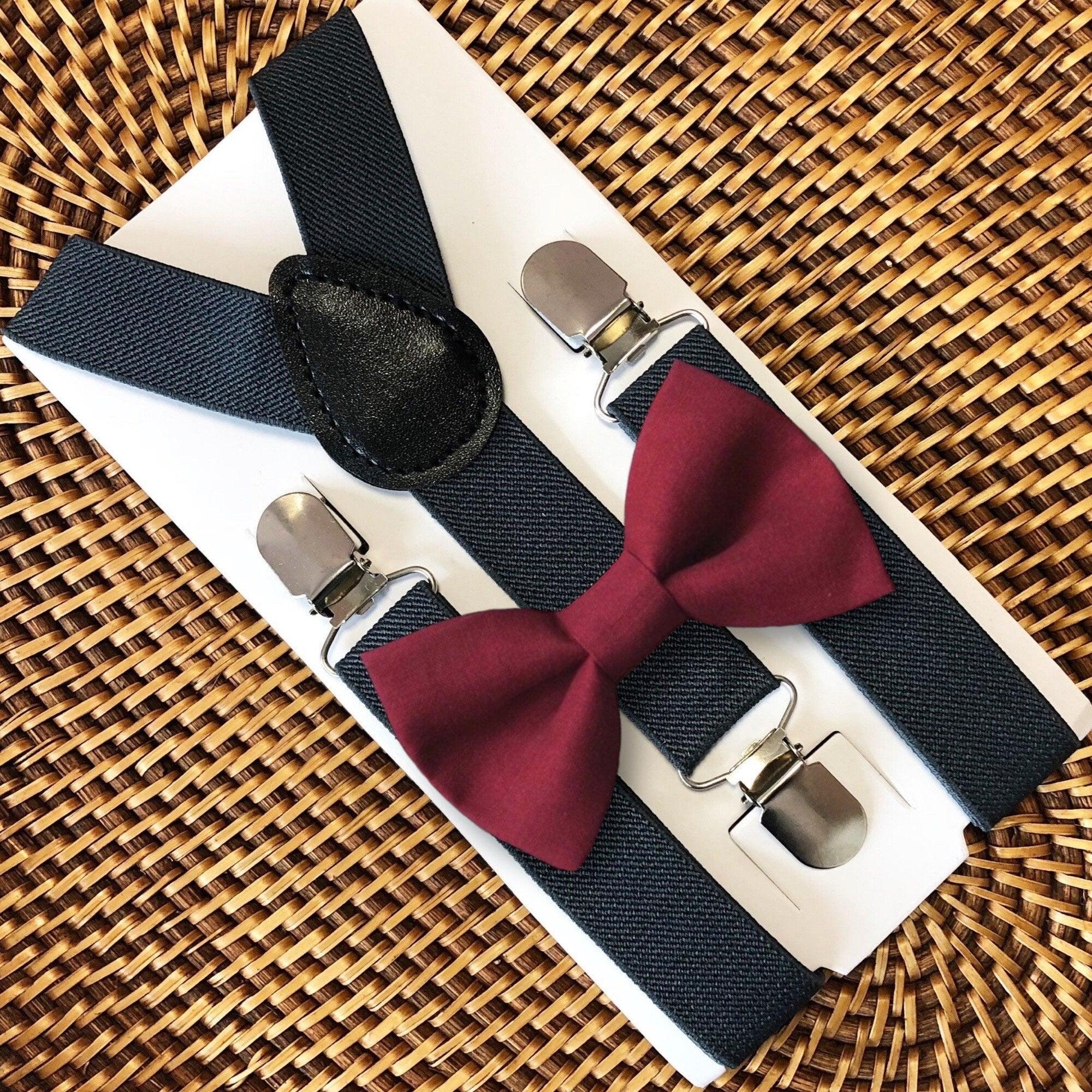 The Bold Bow Tie size chart for bow tie and suspender sets showing Small, Medium, Adult, and Big & Tall sizes with typical age ranges, suspender lengths, and bow tie widths. Small fits ages 6 months–6 years with 18–29 inch suspenders and a 3.5 inch bow tie; Medium fits ages 7–12 years with 25.5–40 inch suspenders and a 4 inch bow tie; Adult fits ages 13 years–6 feet tall with 25.5–40 inch suspenders and a 4.5 inch bow tie; Big & Tall fits over 6 feet tall with 31–53 inch suspenders and a 4.5 inch bow tie.