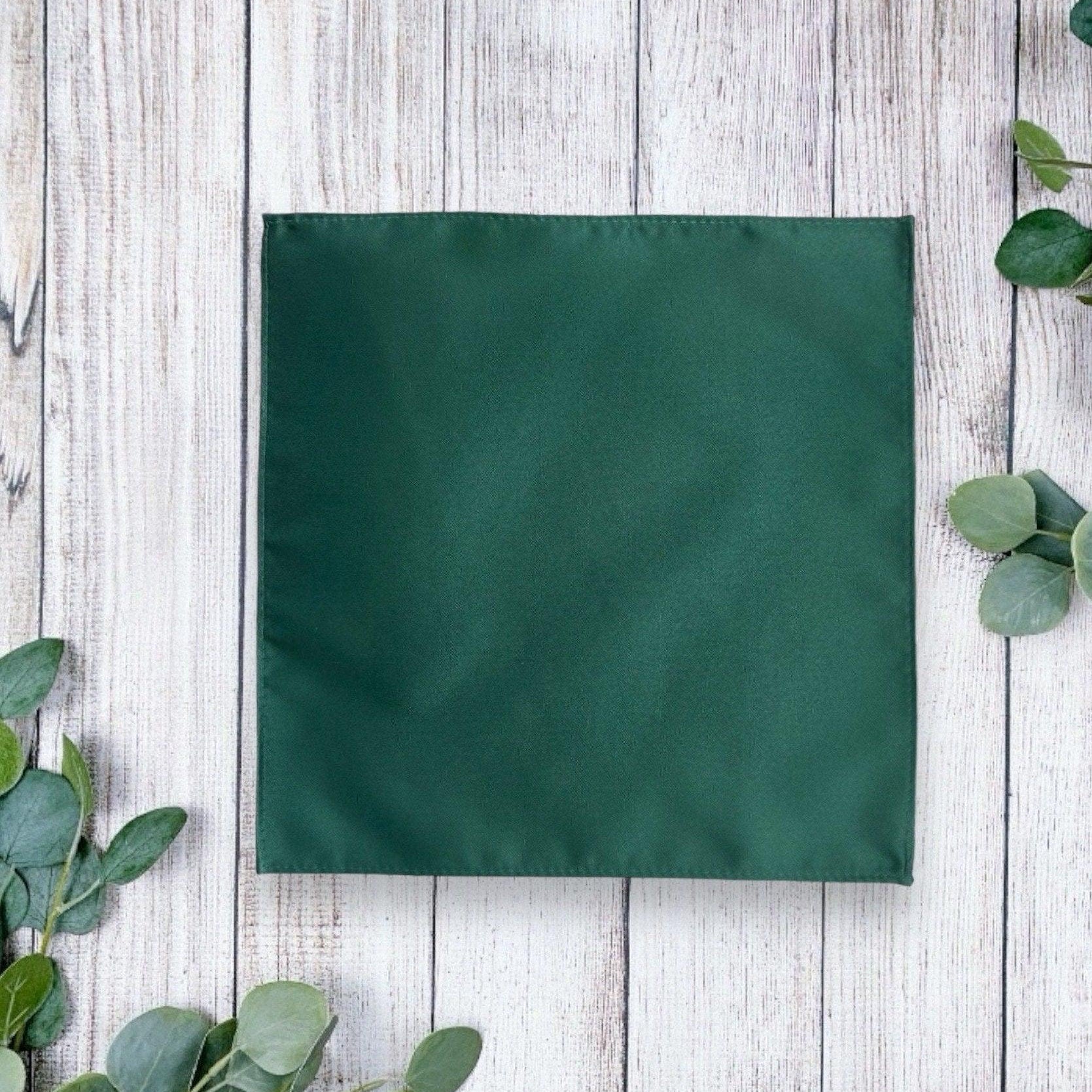 Emerald green pocket square for a wedding.