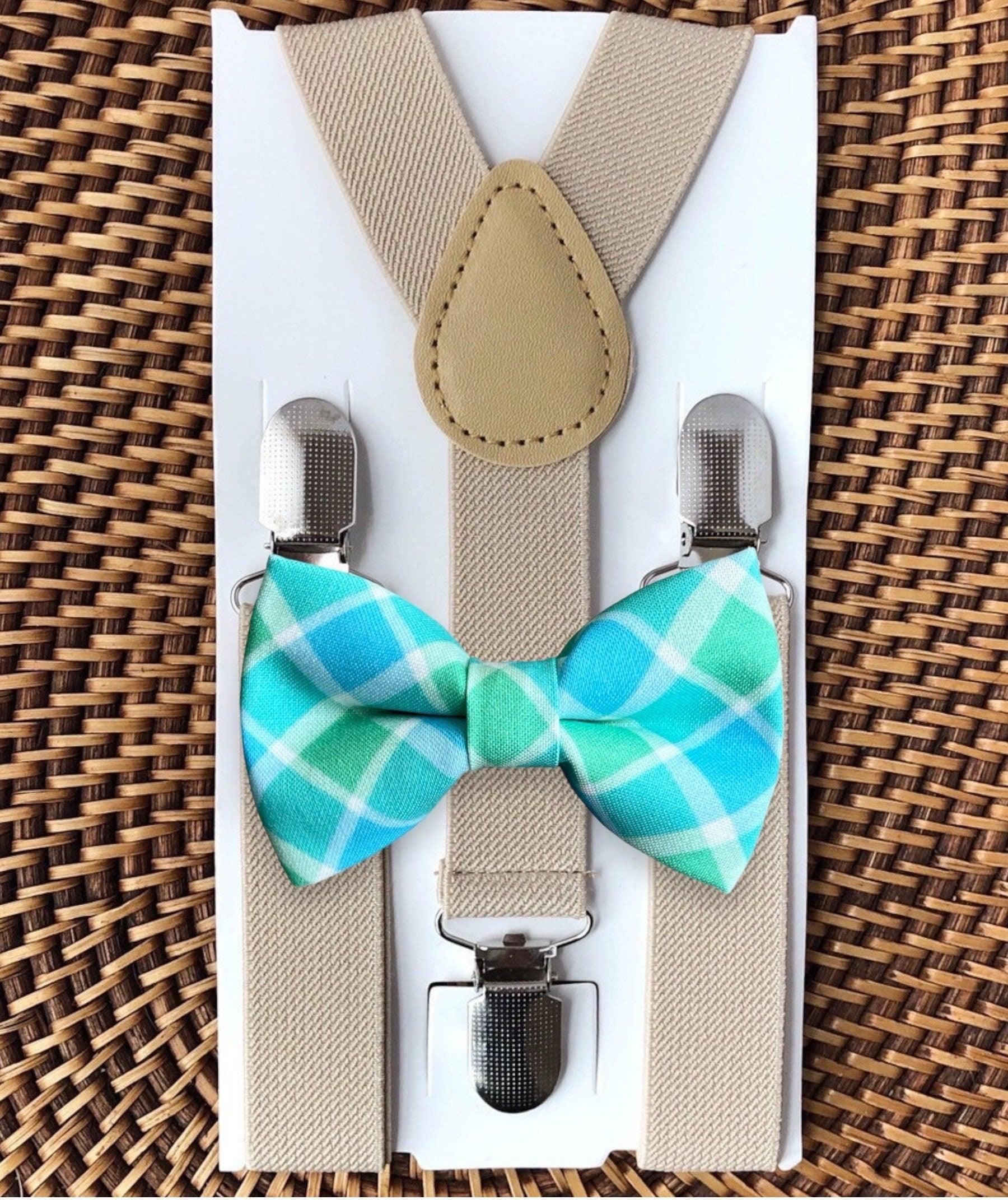 Size chart for suspender and bow tie sets from The Bold Bow Tie. Small (6mo-6yr): 18"-29" suspenders, 3.5" bow. Medium (7-12yr): 25.5"-40" suspenders, 4" bow. Adult (13yr-6ft tall): 25.5"-40" suspenders, 4.5" bow. Big & Tall (Over 6ft tall): 31"-53" suspenders, 4.5" bow. Instructions note to measure from the back waistband over the shoulder to the front waistband for a comfortable fit.