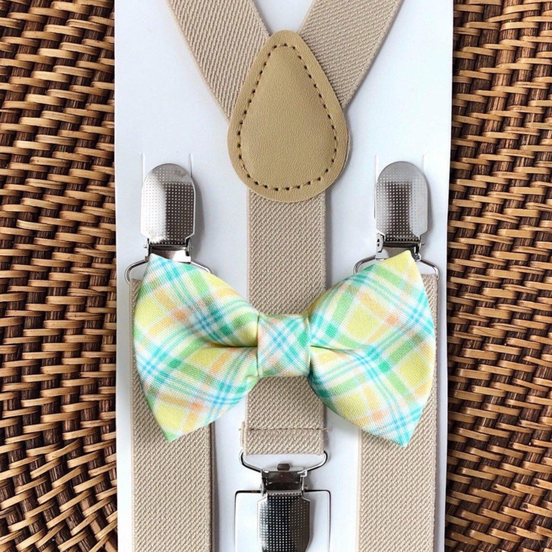 Size chart for suspender and bow tie sets from The Bold Bow Tie. Small (6mo-6yr): 18"-29" suspenders, 3.5" bow. Medium (7-12yr): 25.5"-40" suspenders, 4" bow. Adult (13yr-6ft tall): 25.5"-40" suspenders, 4.5" bow. Big & Tall (Over 6ft tall): 31"-53" suspenders, 4.5" bow. Instructions note to measure from the back waistband over the shoulder to the front waistband for a comfortable fit.