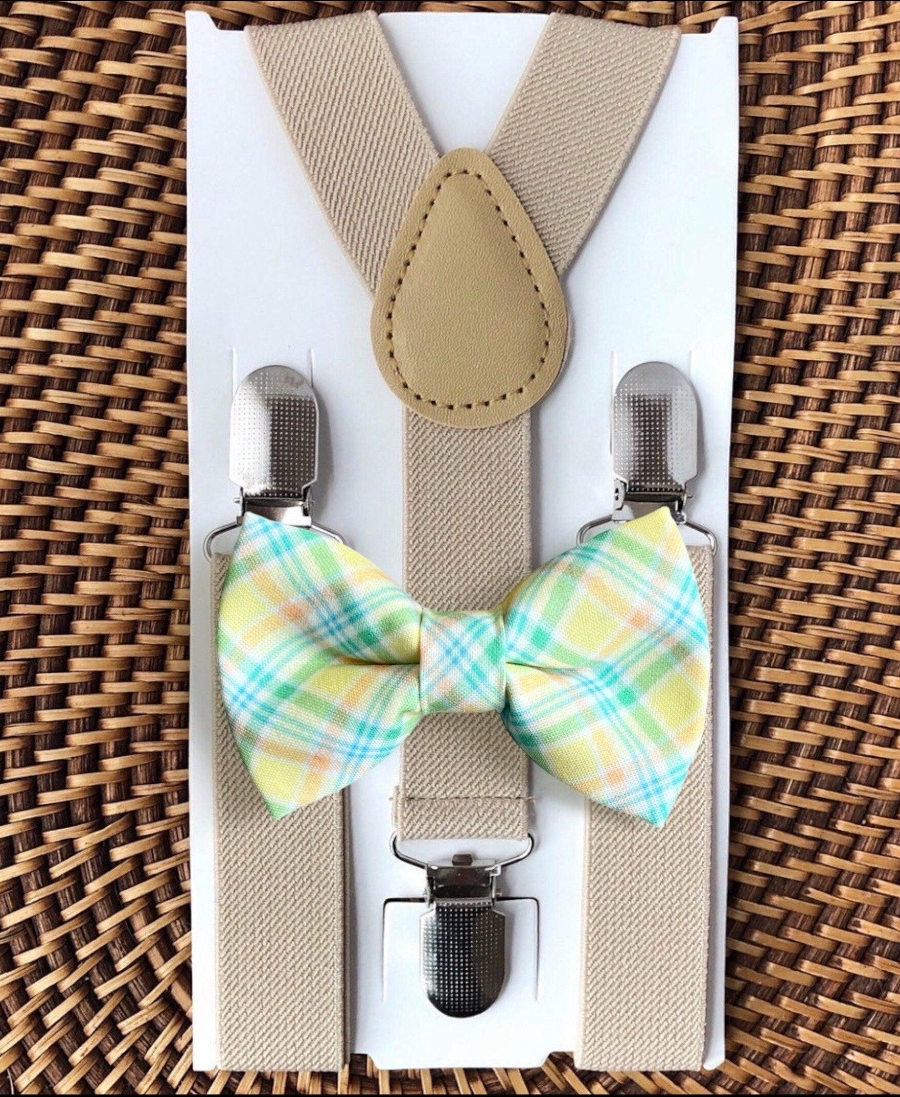 Size chart for suspender and bow tie sets from The Bold Bow Tie. Small (6mo-6yr): 18"-29" suspenders, 3.5" bow. Medium (7-12yr): 25.5"-40" suspenders, 4" bow. Adult (13yr-6ft tall): 25.5"-40" suspenders, 4.5" bow. Big & Tall (Over 6ft tall): 31"-53" suspenders, 4.5" bow. Instructions note to measure from the back waistband over the shoulder to the front waistband for a comfortable fit.