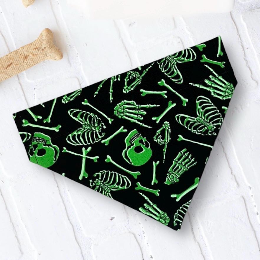Halloween skull and skeleton pattern on a black dog bandana