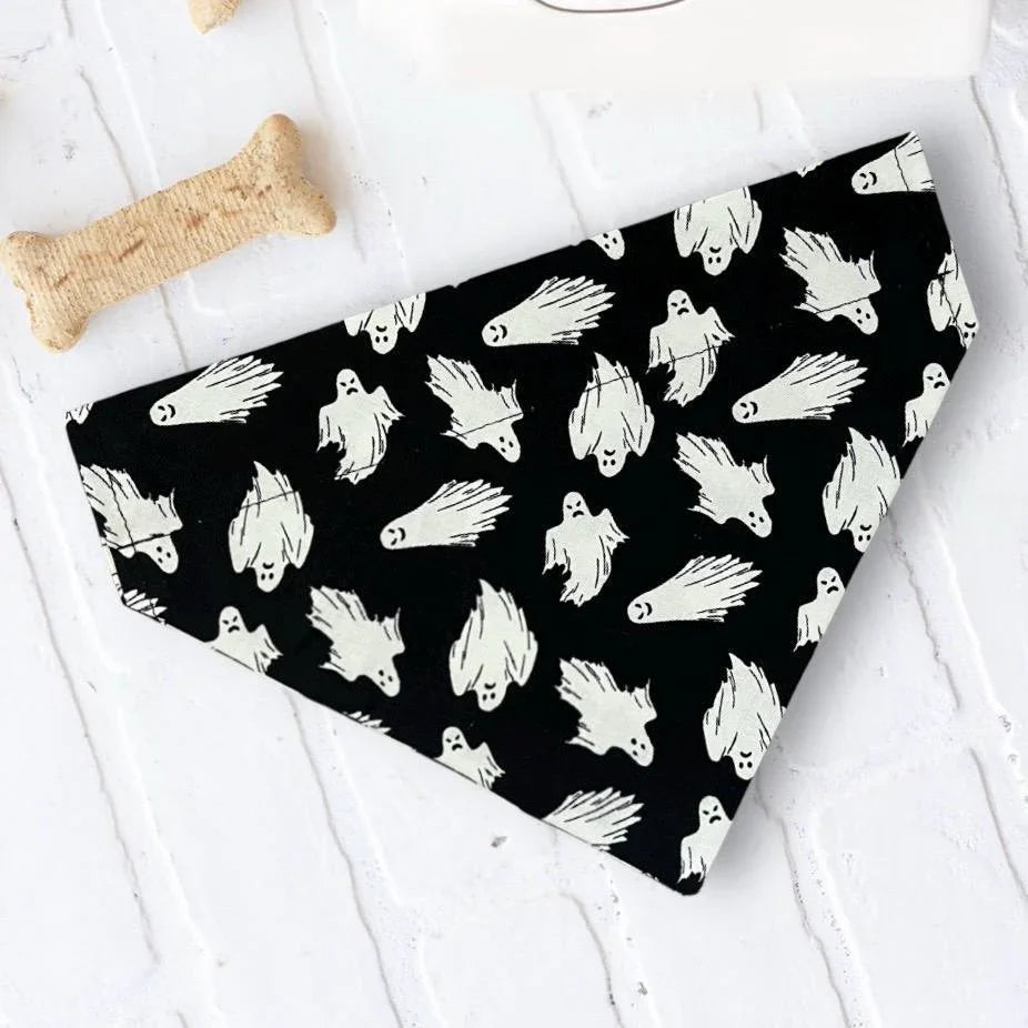 Black pet bandana with white ghost shapes for Halloween