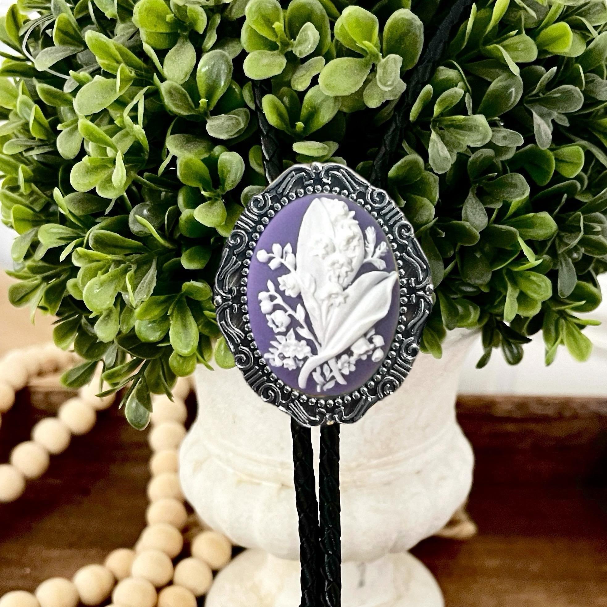 Silver Floral purple Lily of the Valley Bolo Tie for men for wedding, groomsmen, and ring bearer outfits.