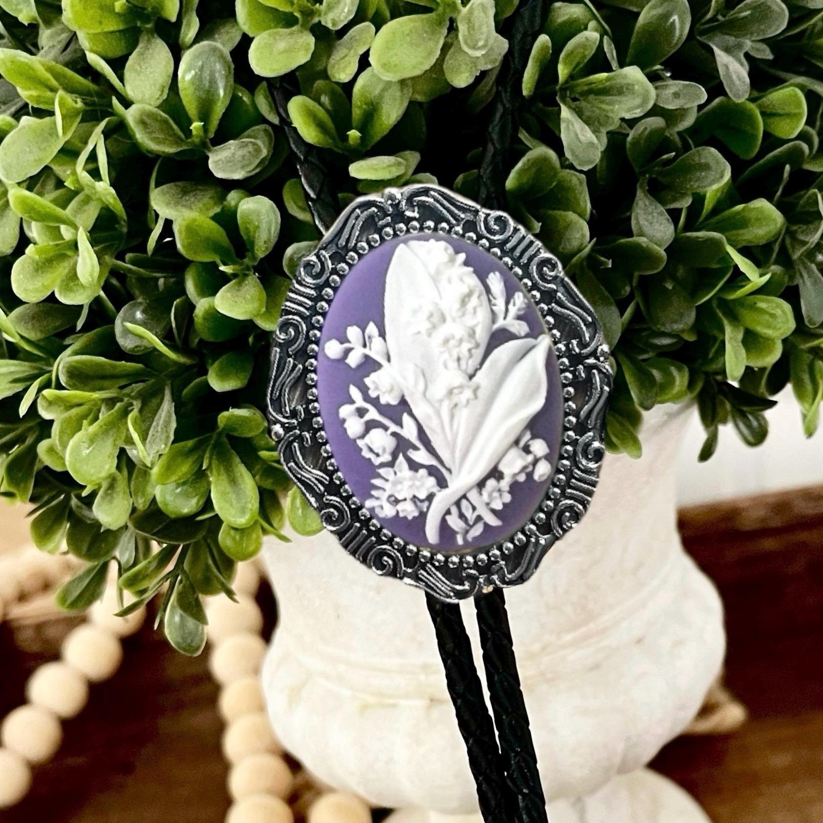 Silver Floral purple Lily of the Valley Bolo Tie for men for wedding, groomsmen, and ring bearer outfits.