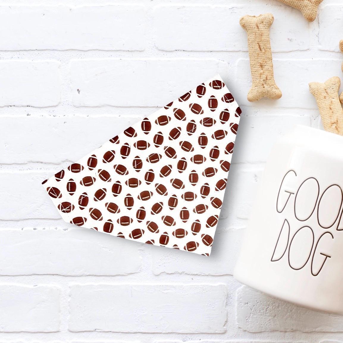 Fluffy tan dog wearing a handmade Stud Muffin dog bandana from The Bold Bow Tie, with product features including handmade design, comfortable collar slide-on fit, high-quality fabric, and sizes for all breeds.