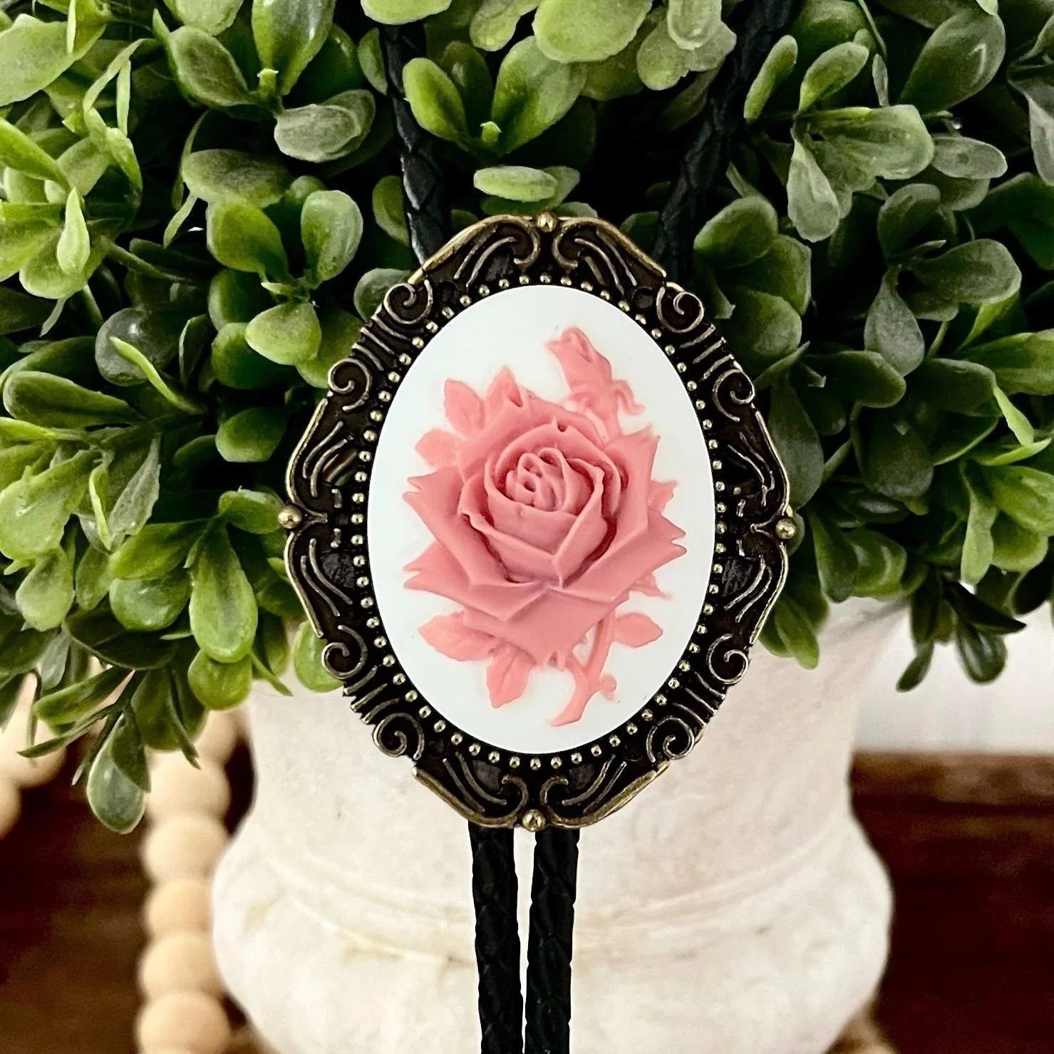 Close up of Bolo Tie with Rose - White & Pink Flower for Western Gifts