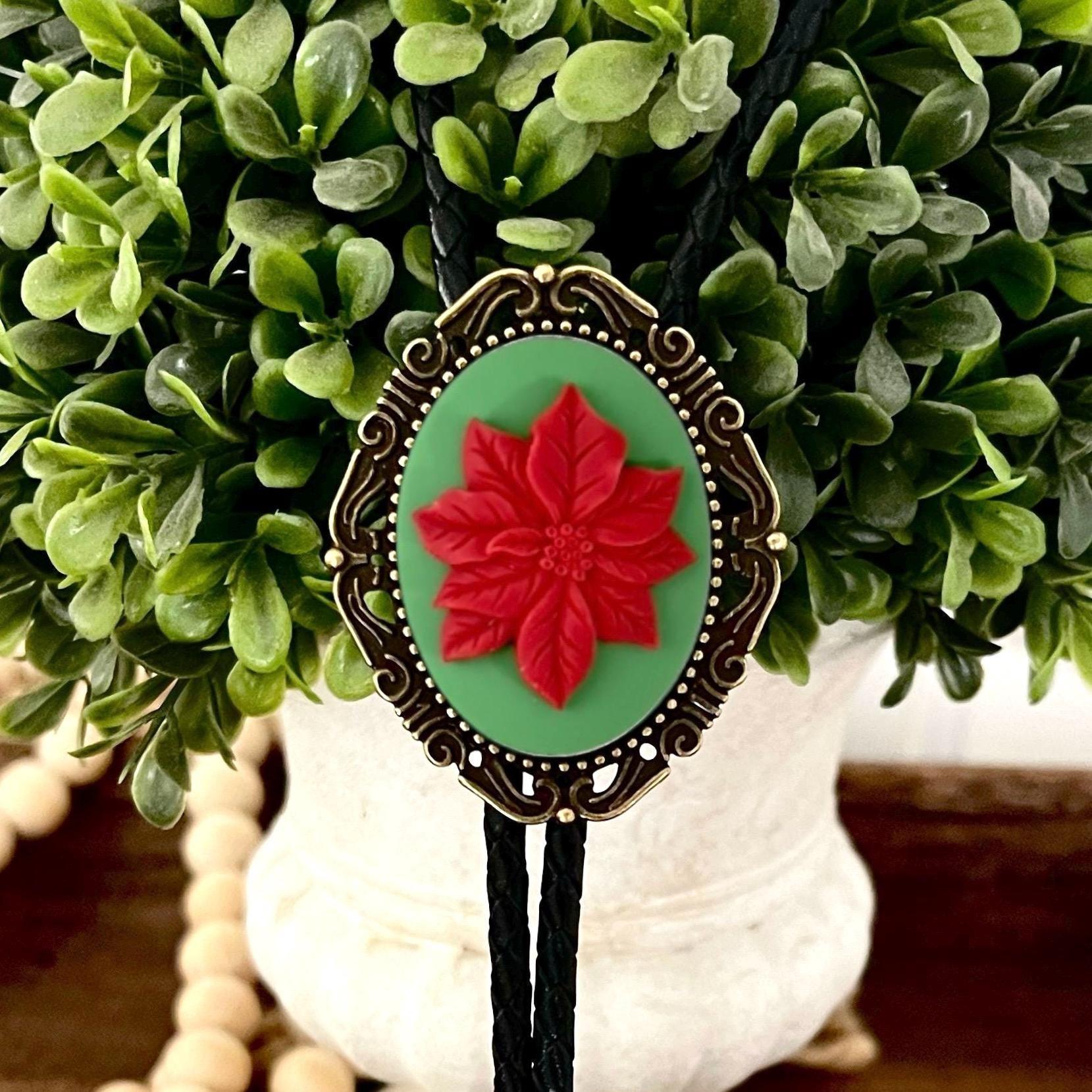 Close up of Brass Bolo Tie - Christmas Poinsettia Flower
