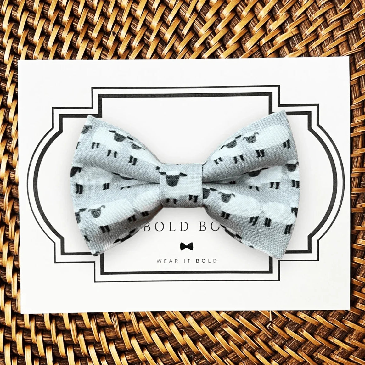 Dog bow tie size chart. Size Small is 3 1/2 inches wide for small dogs under 15 lbs. Size Medium is 4 inches wide for medium dogs between 15 band 40 lbs. Size Large is 4 1/2 inches wide for Large Dogs between 40 band 80 lbs. Size Extra Large is 5 1/2 inches wide for Extra Large Dogs over 80 lbs. Sizing is up to preference and pet bow ties slide on to dog collars with elastic.