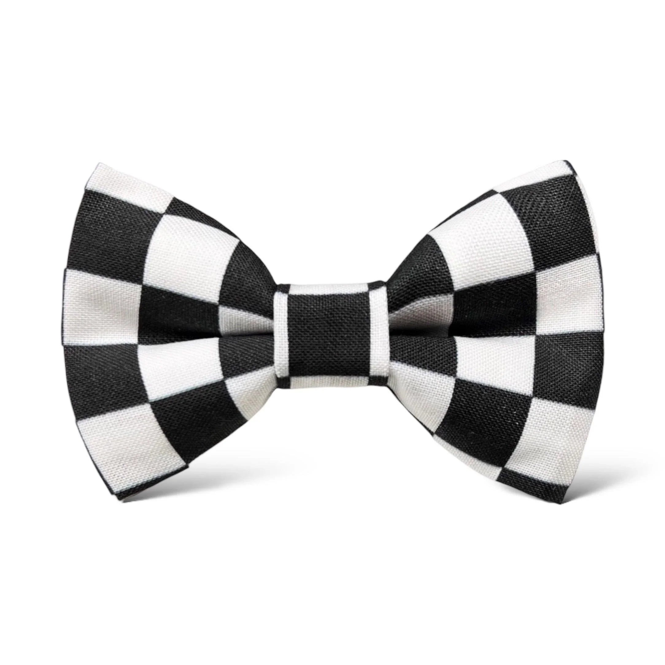 Size chart for pre-tied bow ties from The Bold Bow Tie detailing measurements across three sizes. Small is 3.5 inches wide and recommended for ages 6 months to 5 years. Medium is 4 inches wide and recommended for ages 6 to 12 years. Large is 4.5 inches wide and recommended for ages 13 years and up. Visual icons illustrate the relative sizes with horizontal arrows showing that width is measured from wingtip to wingtip. Bottom text notes that all bow ties are pre-tied and ready to add to your outfit.