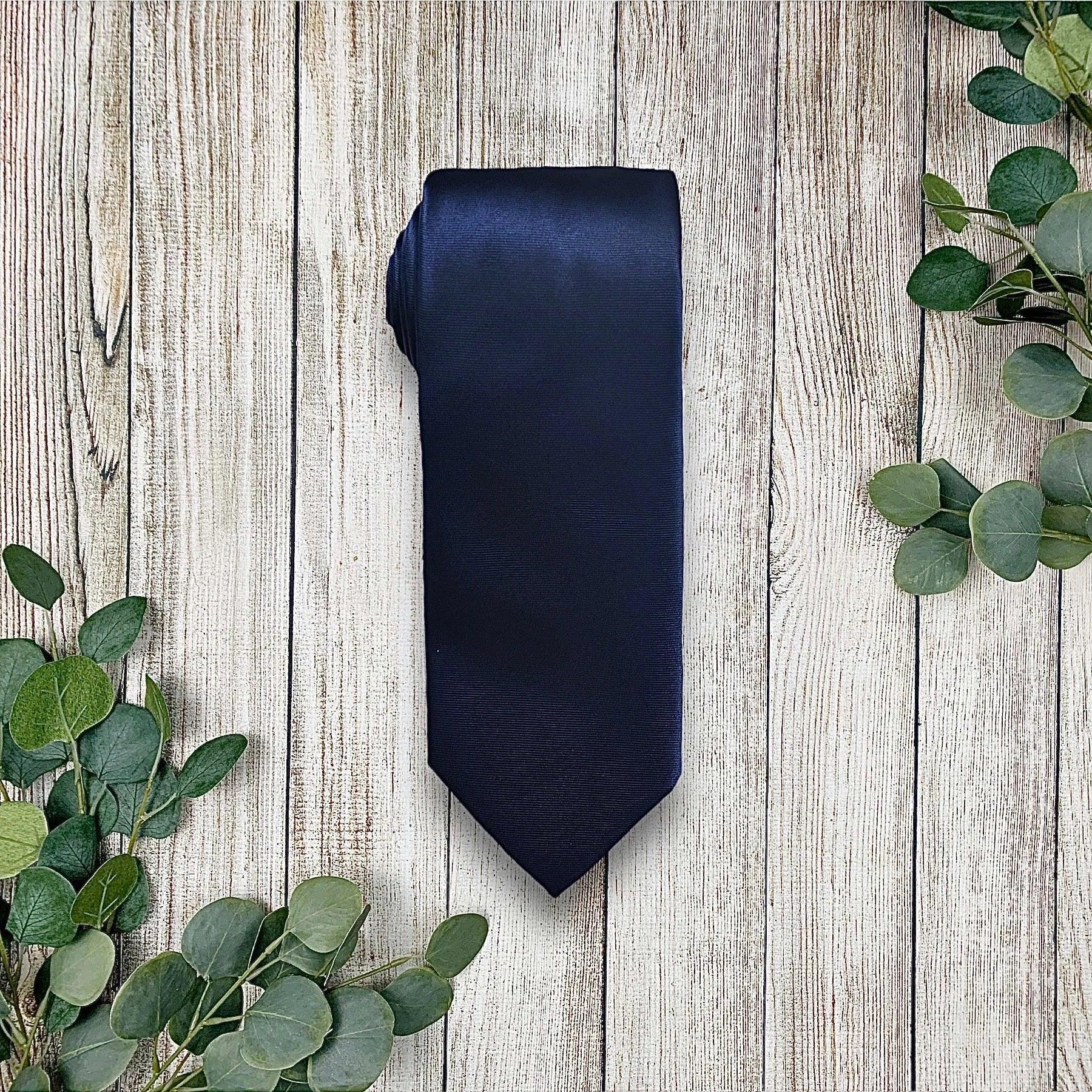 Navy blue men’s tie for wedding or special event.