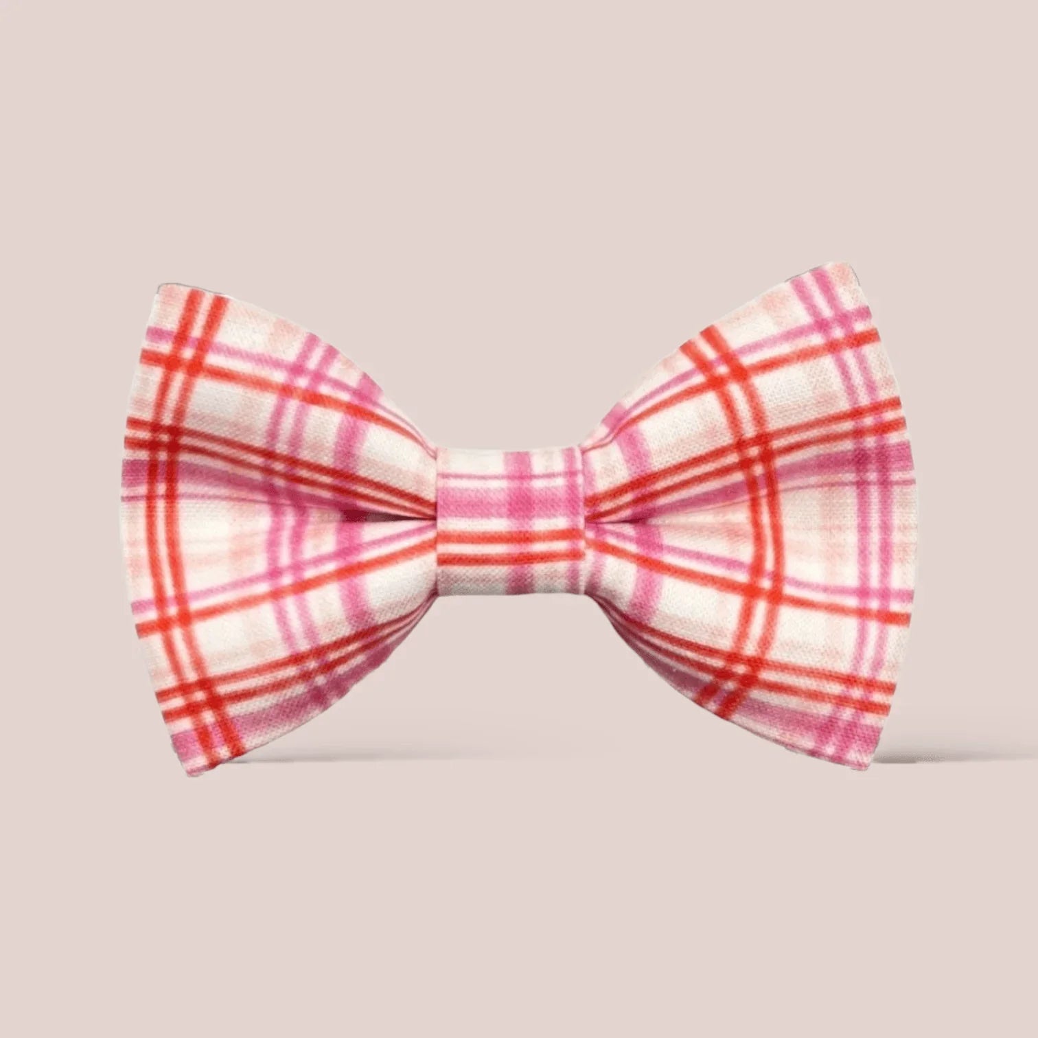Promotional graphic from The Bold Bow Tie titled Let's Connect. On the left, a model with wavy blonde hair wears a white hair bow with a blue floral pattern. Circular text reads Handmade, 5-Star Rated, Premiere Customer Service. On the right, an Instagram icon prompts to follow @theboldbowtie and message for a coupon code. Below, an email icon encourages signing up for the VIP email list for the latest news and exclusive discounts, noting that the link to join is in the description.
