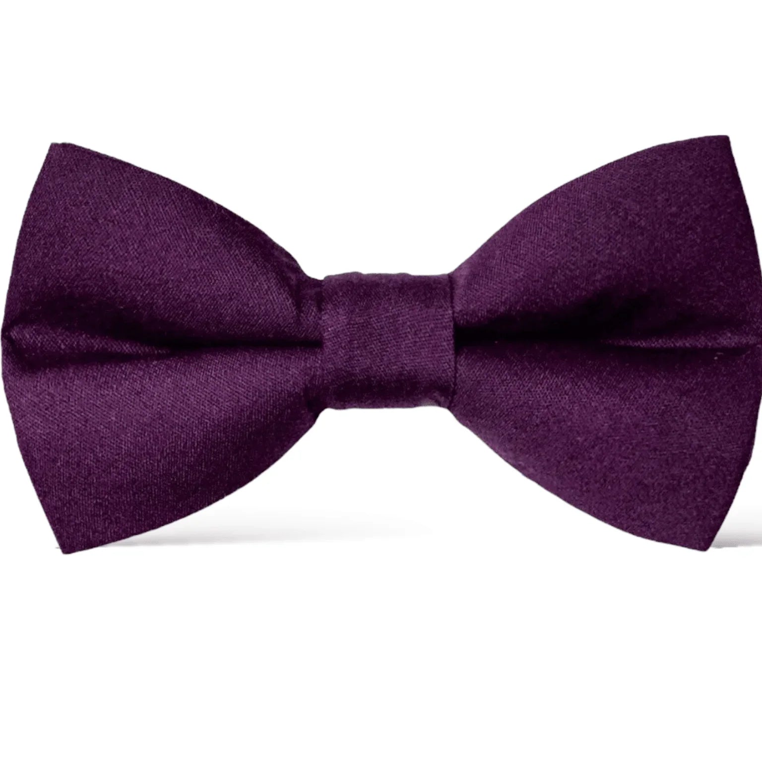 Size chart for pre-tied bow ties from The Bold Bow Tie detailing measurements across three sizes. Small is 3.5 inches wide and recommended for ages 6 months to 5 years. Medium is 4 inches wide and recommended for ages 6 to 12 years. Large is 4.5 inches wide and recommended for ages 13 years and up. Visual icons illustrate the relative sizes with horizontal arrows showing that width is measured from wingtip to wingtip. Bottom text notes that all bow ties are pre-tied and ready to add to your outfit.