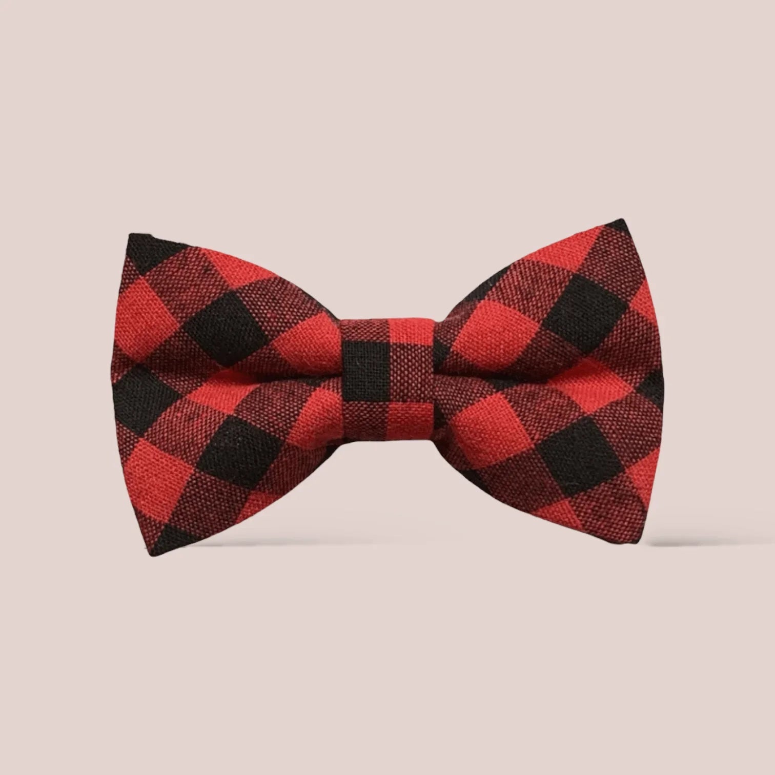 Size chart for hair bows from The Bold Bow Tie detailing dimensions across three sizes. Small is 3.5 inches wide. Medium is 4 inches wide. Large is 4.5 inches wide. Visual graphics illustrate the increasing scale of each bow with horizontal dotted arrows showing that the width is measured from side to side. Bottom text specifies that all hair bows come on alligator clips.