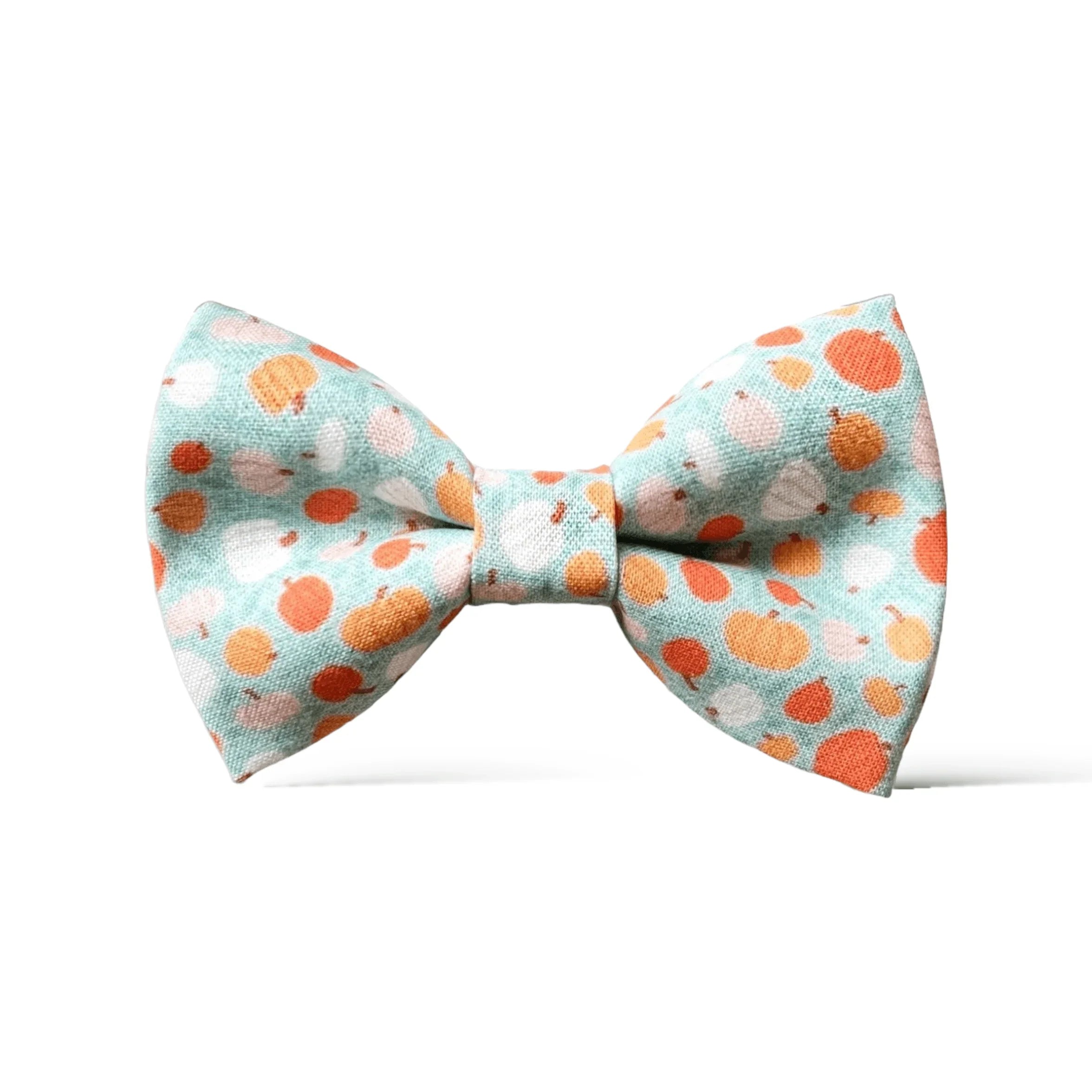 Autumn Bow tie with orange and white pattern on a light blue background