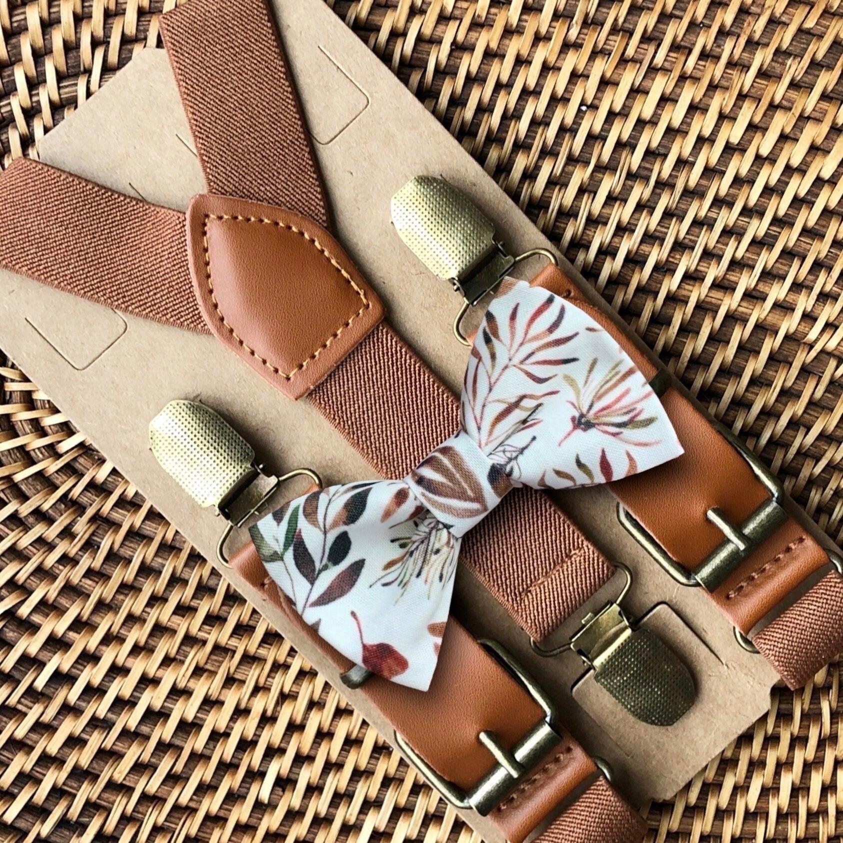 Size chart for suspender and bow tie sets from The Bold Bow Tie. X-Small (6mo-4yr): 15"-23" suspenders, 3.5" bow. Small (5-9yr): 18"-33" suspenders, 3.5" bow. Medium (10-12yr): 18"-33" suspenders, 4" bow. Adult (13yr-6'5"): 30"-53" suspenders, 4.5" bow. Big & Tall (Over 6'5"): 53"+ suspenders, 4.5" bow. Instructions note to measure from the back waistband over the shoulder to the front waistband for a comfortable fit.