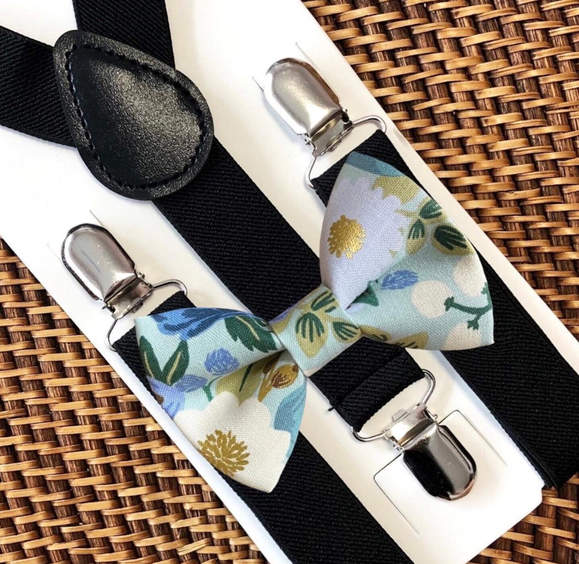 Size chart for suspender and bow tie sets from The Bold Bow Tie. Small (6mo-6yr): 18"-29" suspenders, 3.5" bow. Medium (7-12yr): 25.5"-40" suspenders, 4" bow. Adult (13yr-6ft tall): 25.5"-40" suspenders, 4.5" bow. Big & Tall (Over 6ft tall): 31"-53" suspenders, 4.5" bow. Instructions note to measure from the back waistband over the shoulder to the front waistband for a comfortable fit.