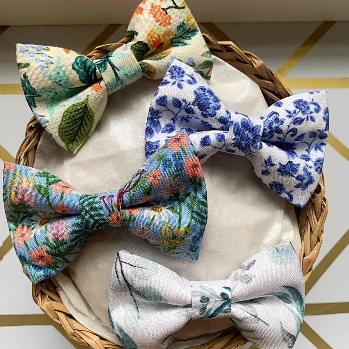 Floral Spring Bow Tie Gift Set includes three patterned bows in a wicker basket